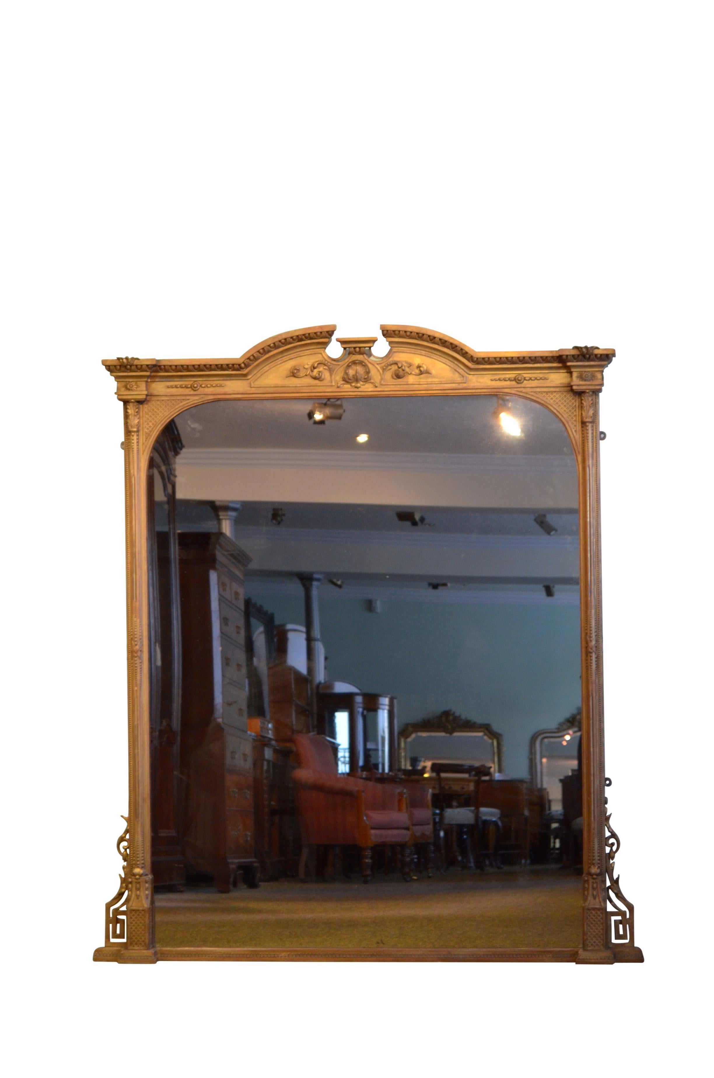 K0574 Superb Victorian overmantle giltwood mirror, having original plate with minor imperceptions in gilded frame with reeded columns, acanthus leaves, floral scrolls, Greek key decoration and egg and dart cornice. This antique mirror retains its