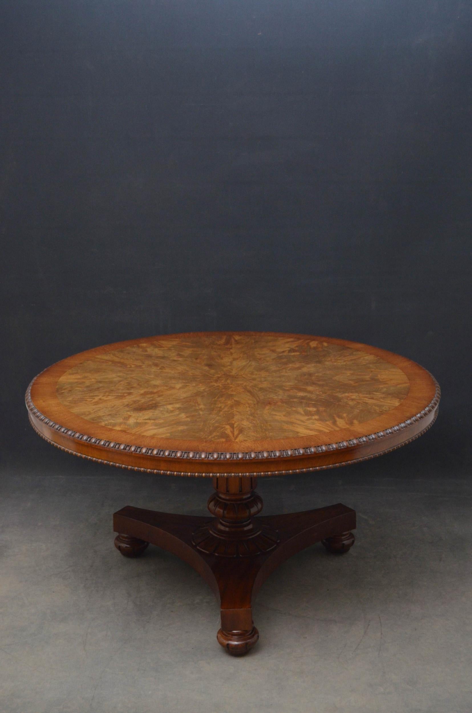 Sn5076 Superb quality William IV mahogany centre or dining table, having segmented flamed mahogany top with partridge wood banding and quarter bead to the edge above shallow frieze with beaded frieze, standing on carved and fluted column with petal