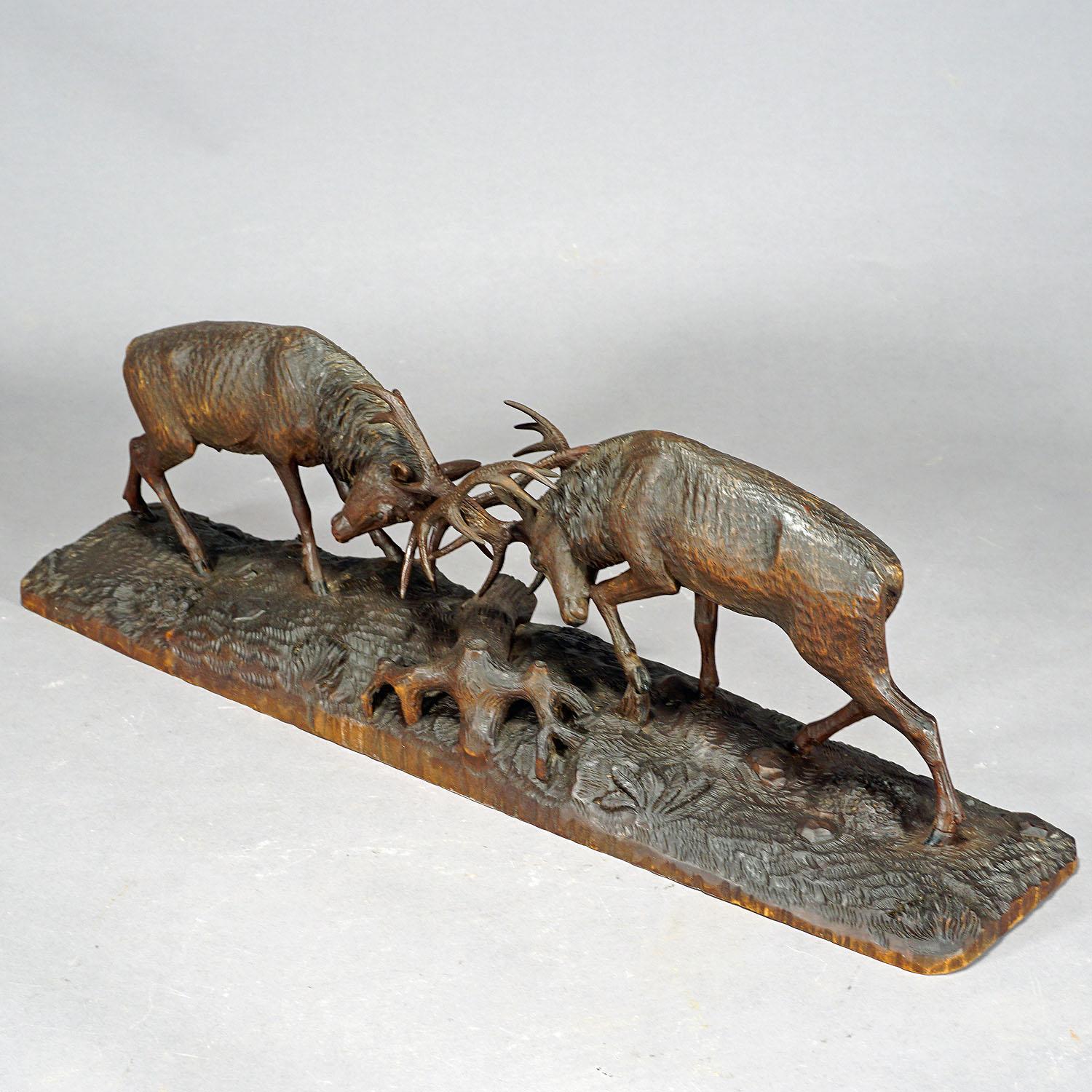 German Outstanding Wooden Carved Fighting Stags by K. Bach, 1946 For Sale