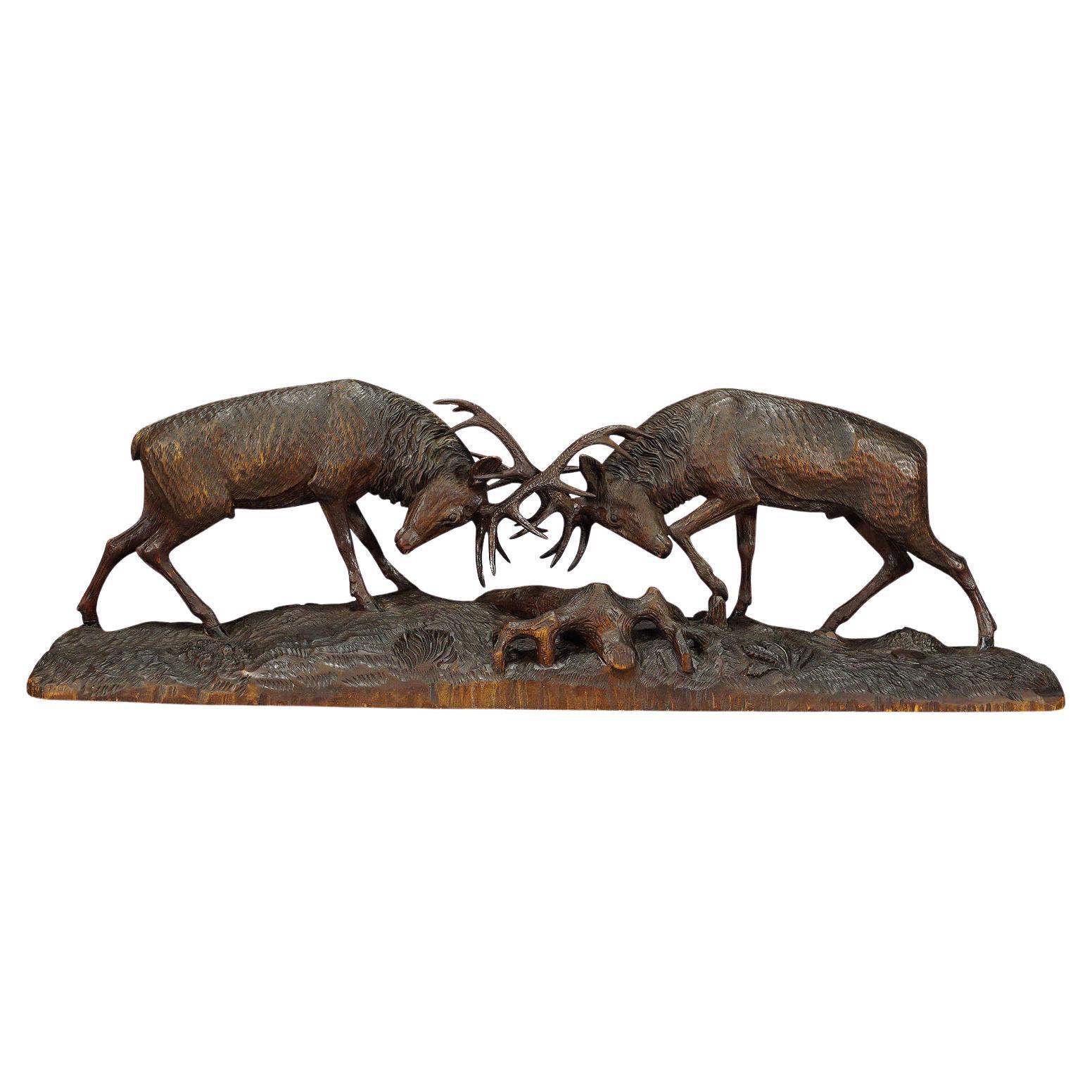 Outstanding Wooden Carved Fighting Stags by K. Bach, 1946 For Sale