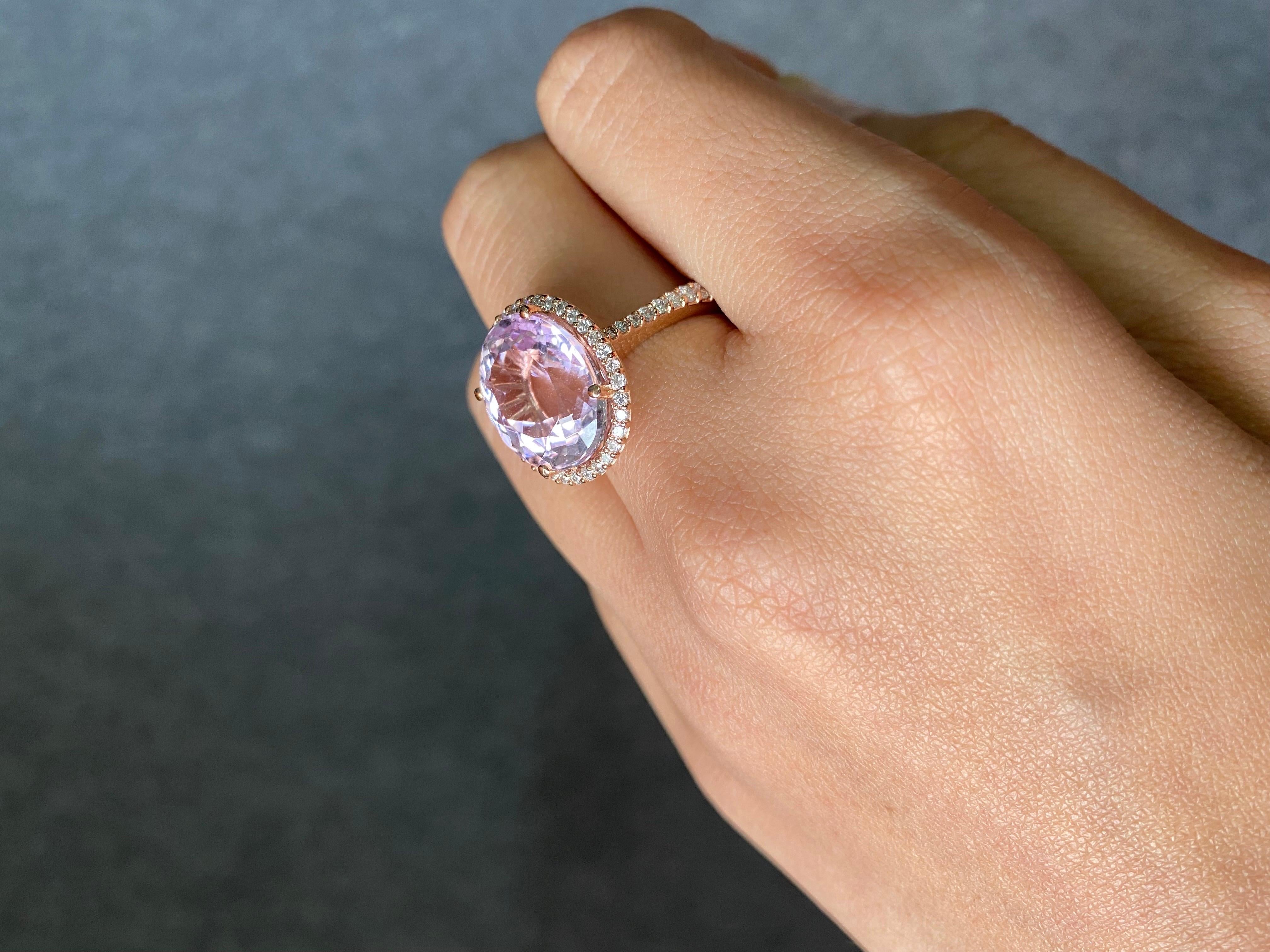 Oval 10.48 Kunzite & Diamond Large Statement Halo Cluster Ring in 18k Pink/Rose Gold

Make a glamorous entrance with this custom made 18k rose/pink gold vintage-influenced ring, artistically crafted in a brightly polished shine. A large cotton candy