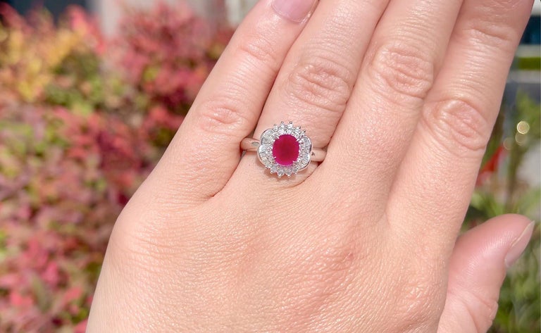 Ruby = 1.23 Carat
Cut: Oval
Diamonds = 0.36 Carats
(Color: E, Clarity: VS)
Metal: Platinum
Ring Size = 6* US
*It can be resized complimentary