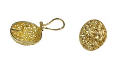 Orecchini ovali in oro giallo 14K