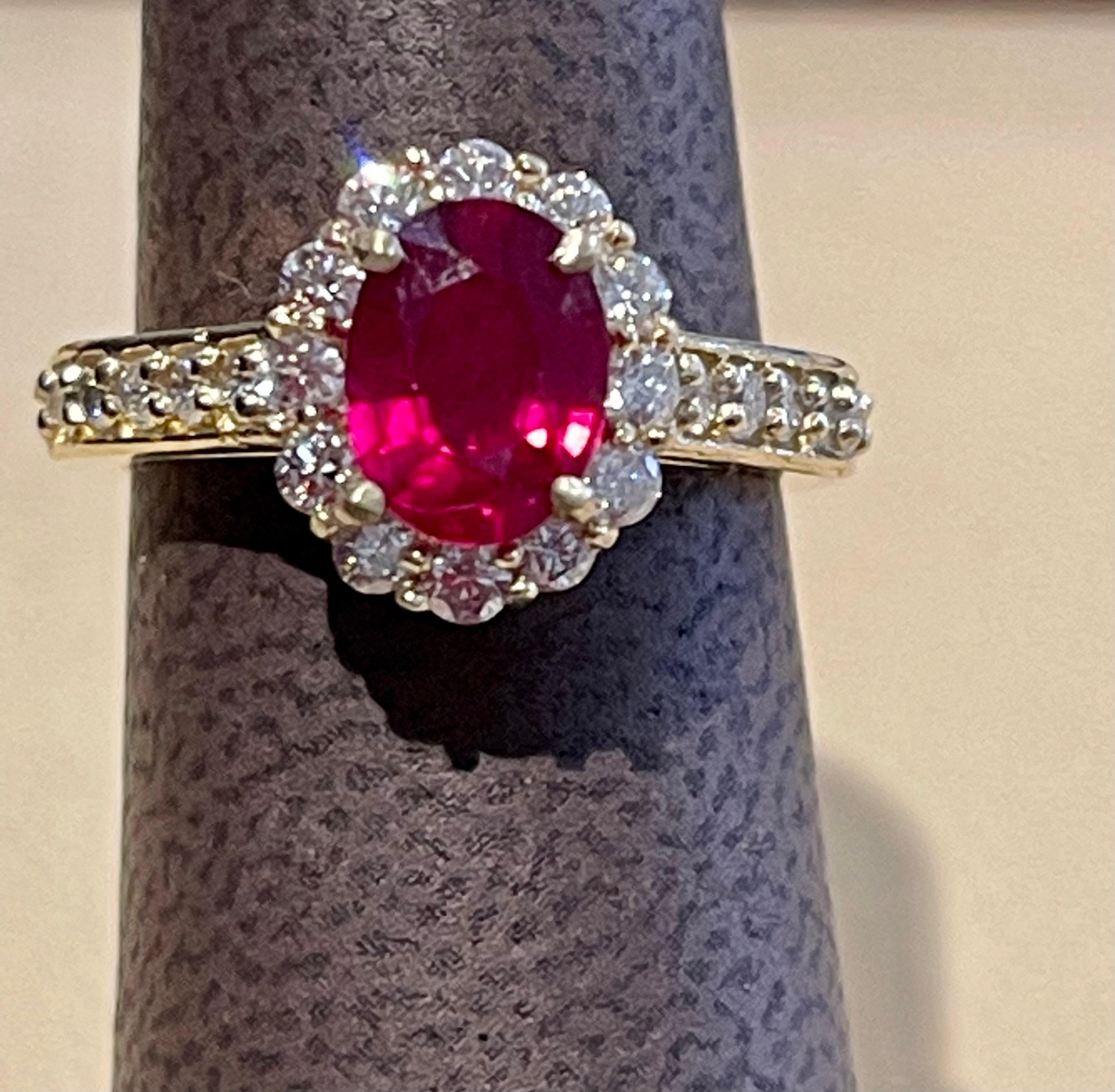 Oval 1.5 Carat Treated Ruby and 1.20 Carat Diamond 14 Karat Yellow Gold Ring For Sale 7
