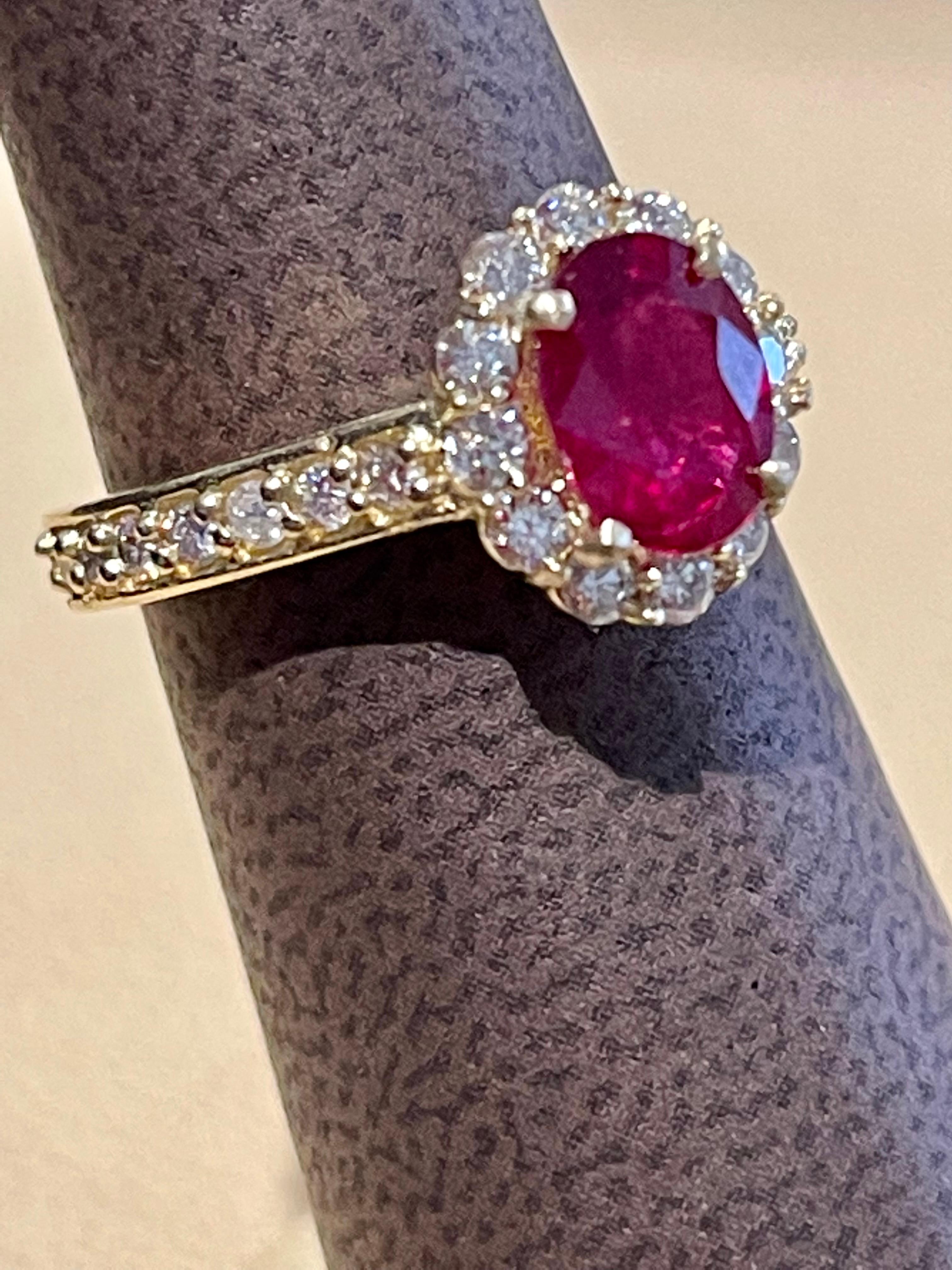Oval 1.5 Carat Treated Ruby and 1.20 Carat Diamond 14 Karat Yellow Gold Ring For Sale 9