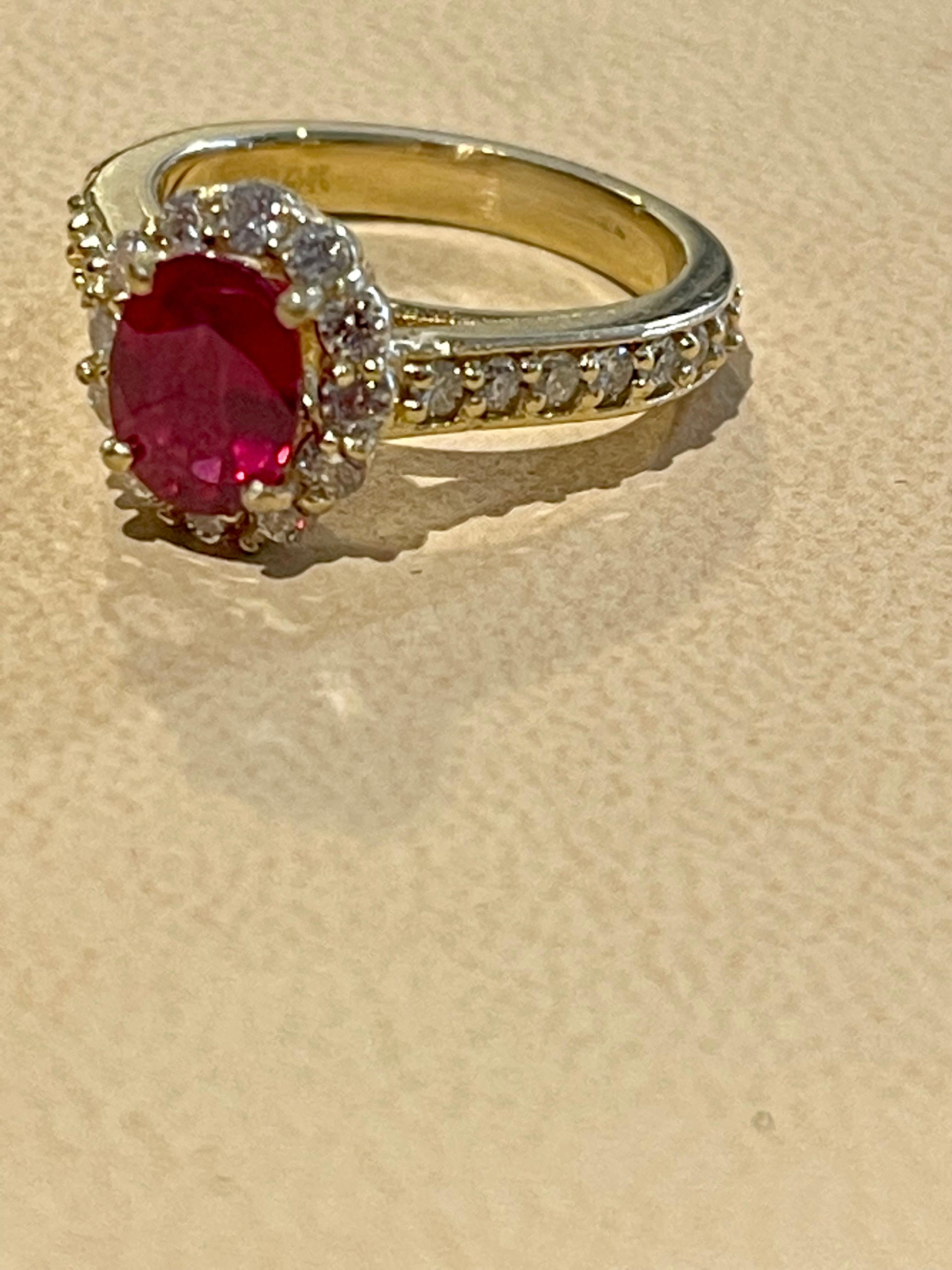 Oval 1.5 Carat Treated Ruby and 1.20 Carat Diamond 14 Karat Yellow Gold Ring For Sale 10