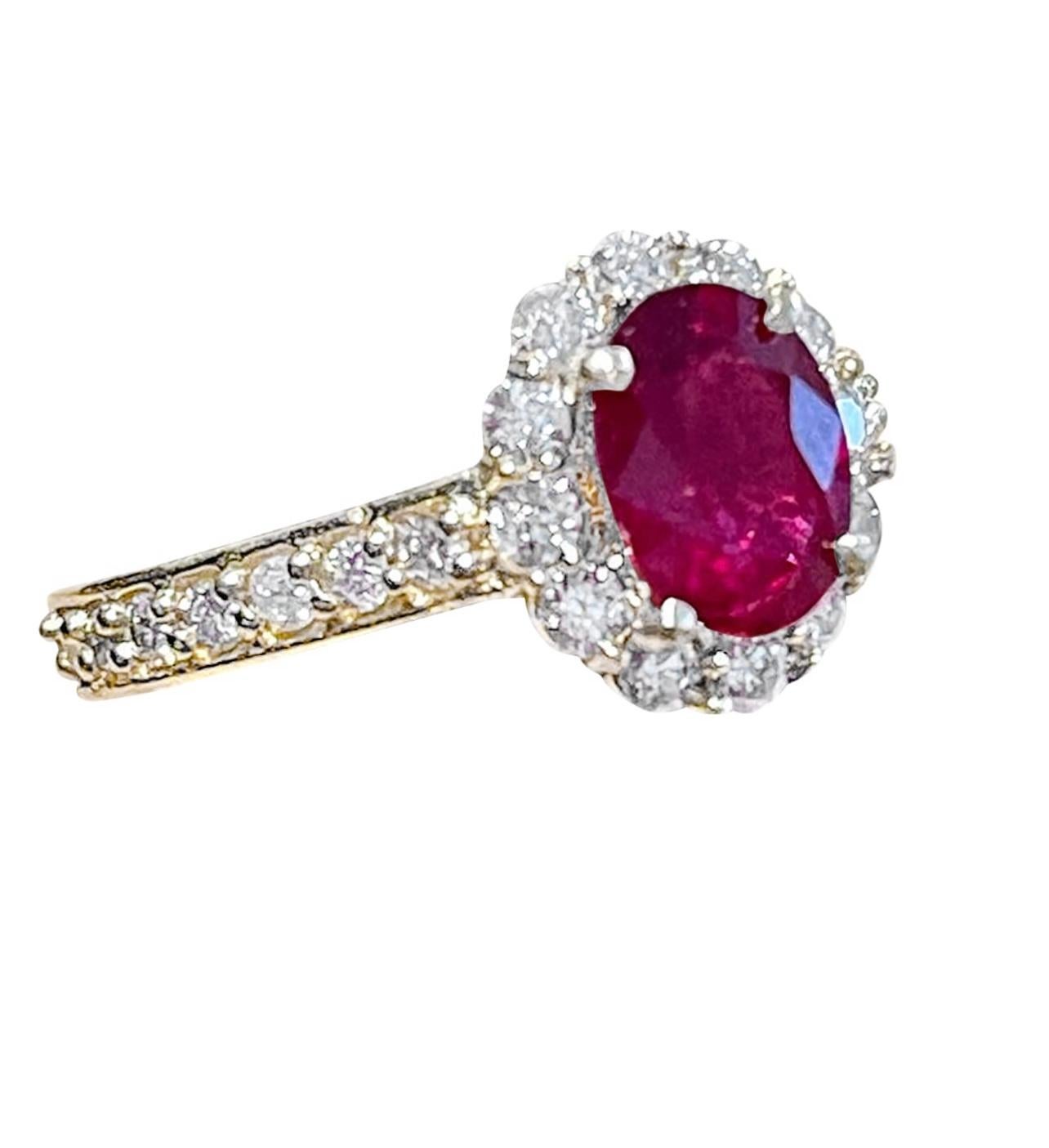 Women's Oval 1.5 Carat Treated Ruby and 1.20 Carat Diamond 14 Karat Yellow Gold Ring For Sale