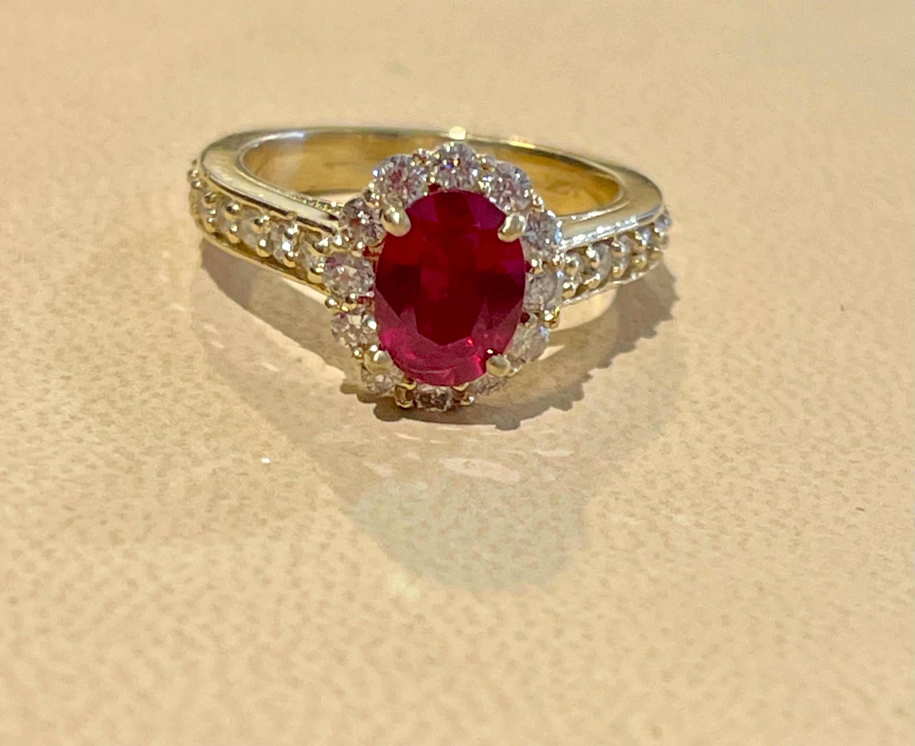 Oval 1.5 Carat Treated Ruby and 1.20 Carat Diamond 14 Karat Yellow Gold Ring For Sale 3