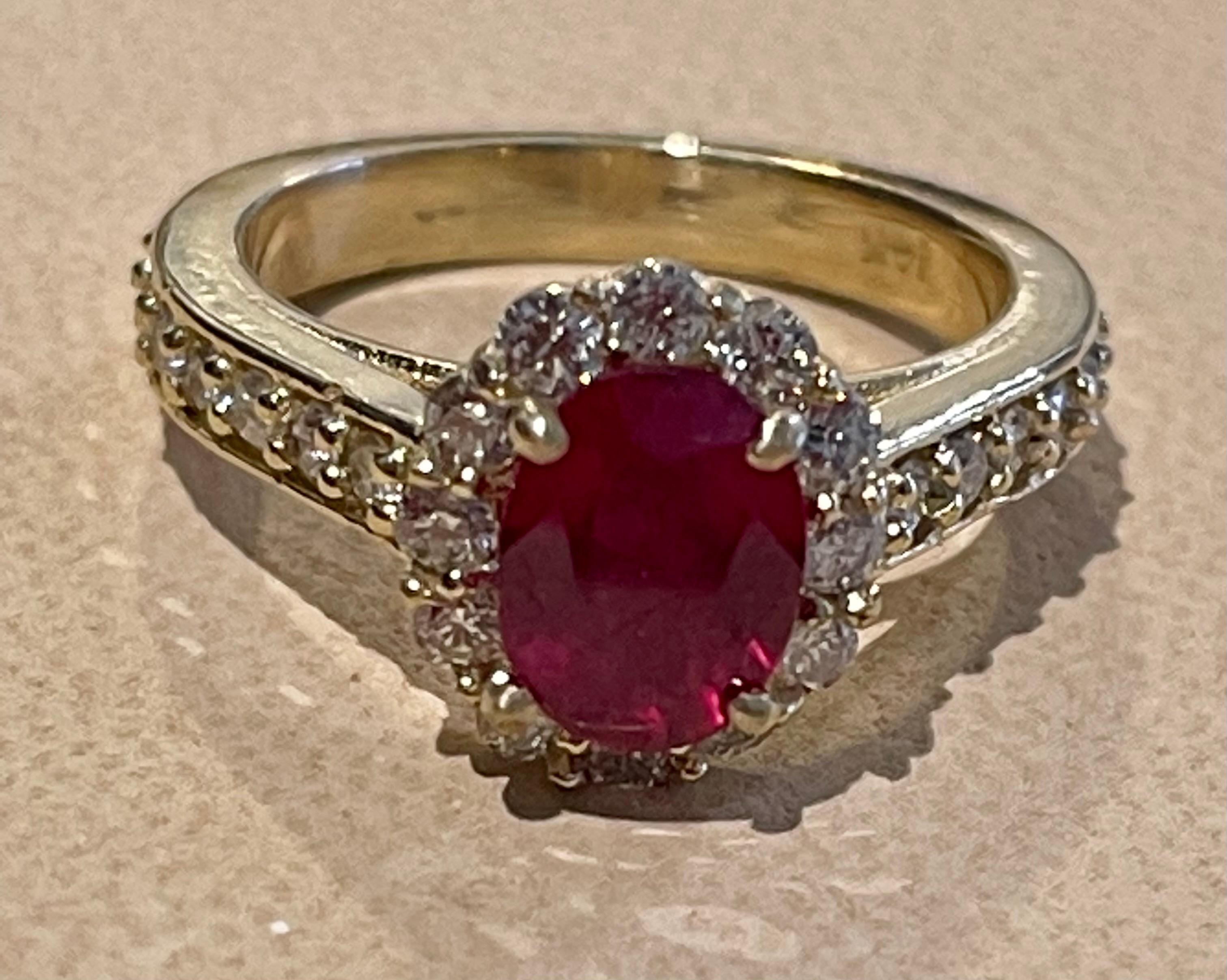 Oval 1.5 Carat Treated Ruby and 1.20 Carat Diamond 14 Karat Yellow Gold Ring For Sale 4