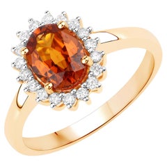 Bague en or jaune 14 carats avec grenat spessartite naturel de 1,70 carat et halo de diamants