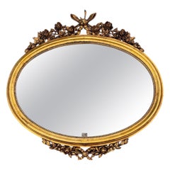 Oval 1940s Wall Mirror With Gold Frame And Floral Decoration In Louis XVI Style