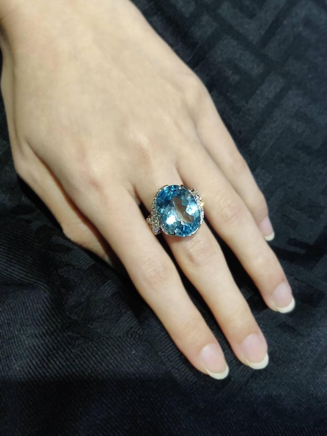Blue Topaz Ring with Pavé Diamonds in 18K White Gold

Please let us know should you wish to have the ring resized.

Ring Size: US 6.75 / 54

Gold: 18K White Gold, 11.379 g
Blue Topaz: Oval, 19.94 ct
Diamond: 1.08 ct