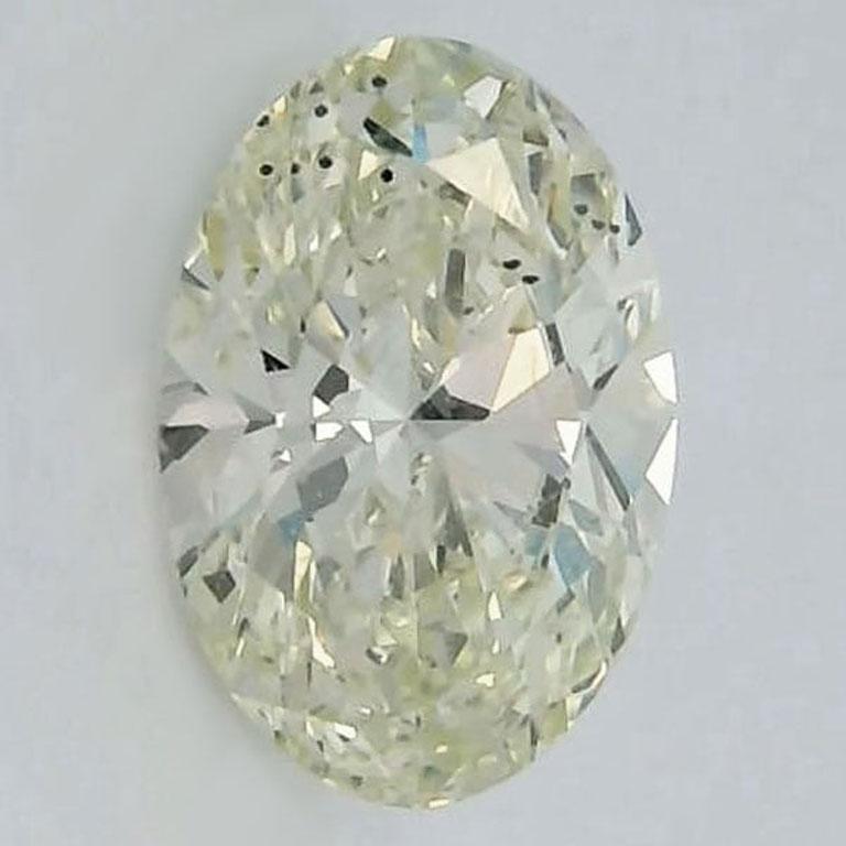 This stunning Oval 2.02 Carat Certified Loose Diamond is a true showstopper, offering exceptional brilliance and timeless elegance. With a clarity grade of SI2 and a M color, this diamond strikes the perfect balance between beauty and value.