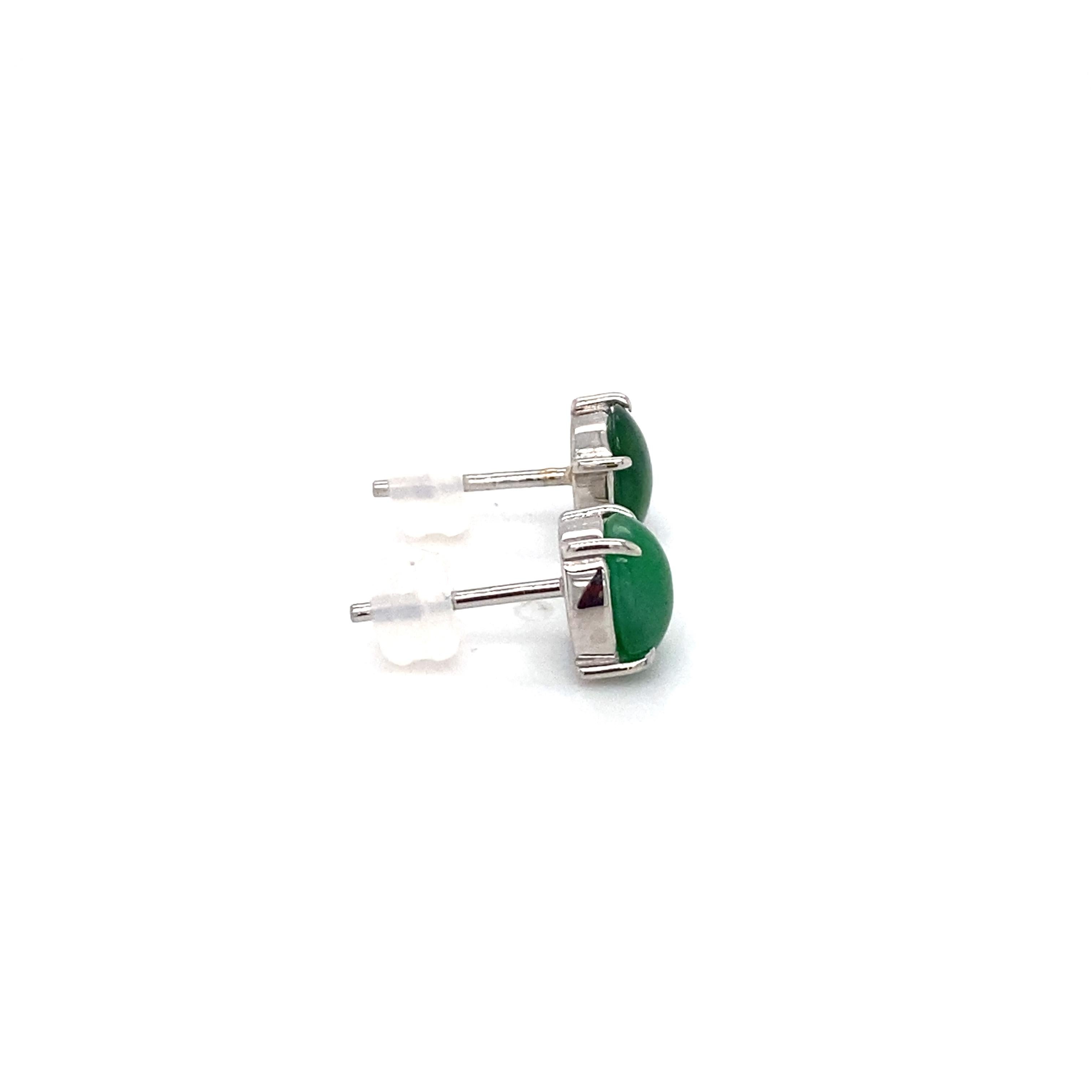 Circa: 1990s
Metal Type: Platinum

Jade Details:
Carat: 2.10 carat total weight
Shape: Oval cabochon
Color: Bright green