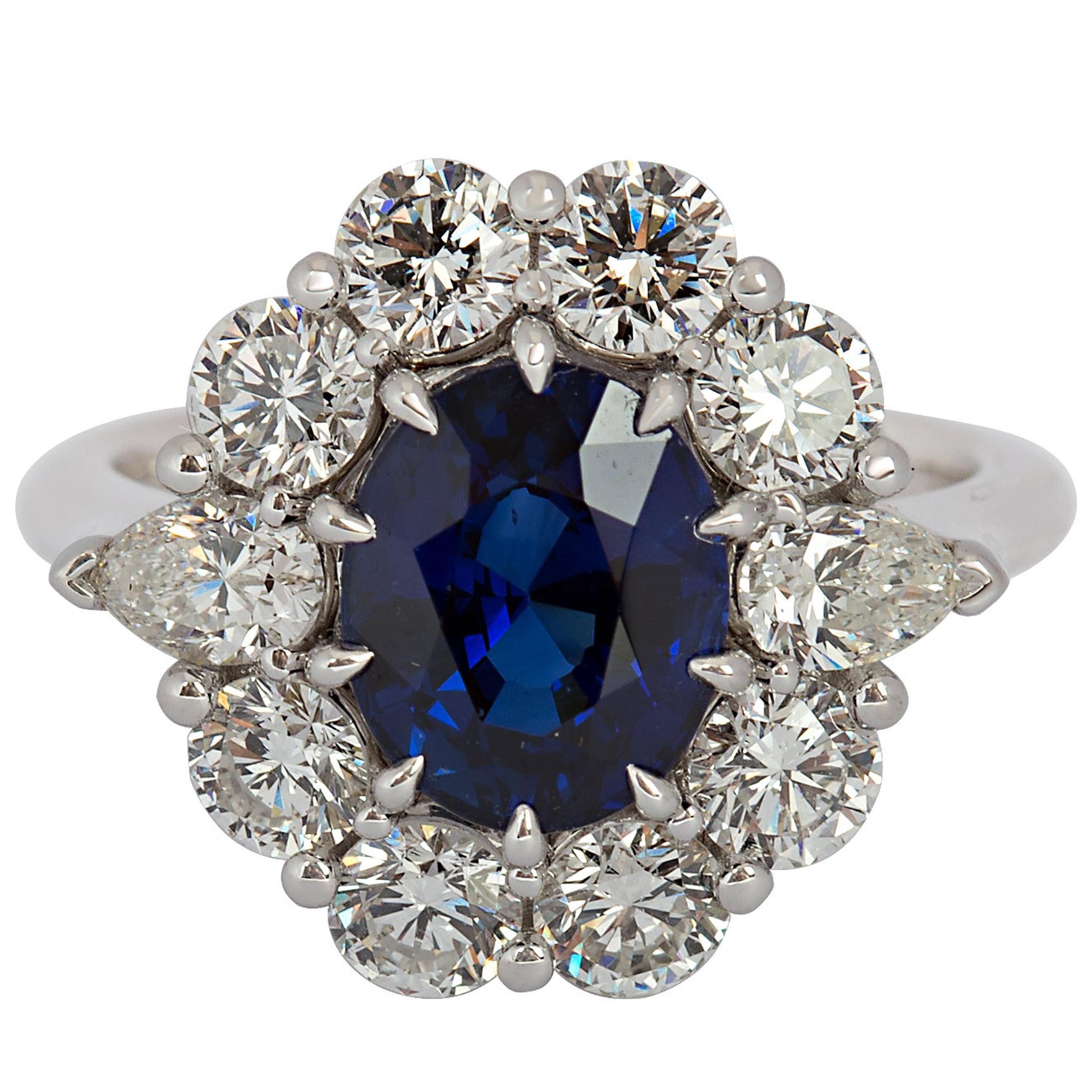 Gems Are Forever Oval 2.73 Carat Blue Sapphire and Diamond Ring For Sale