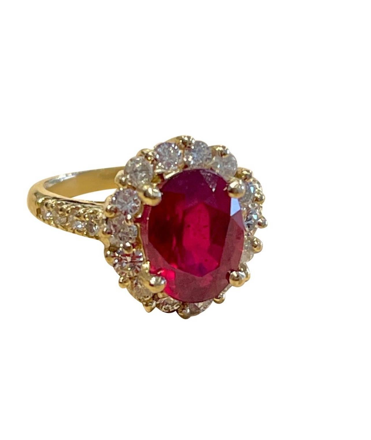 9X11  Oval Cut   Approximately 5  Carat Treated Ruby  14  Karat Yellow Gold Ring Size 6.5
Diamond Brilliant cut approximately 1.25 ct , Very Nice quality of diamonds. Diamonds all around the stone and on the band too
Its a treated ruby prong set
14
