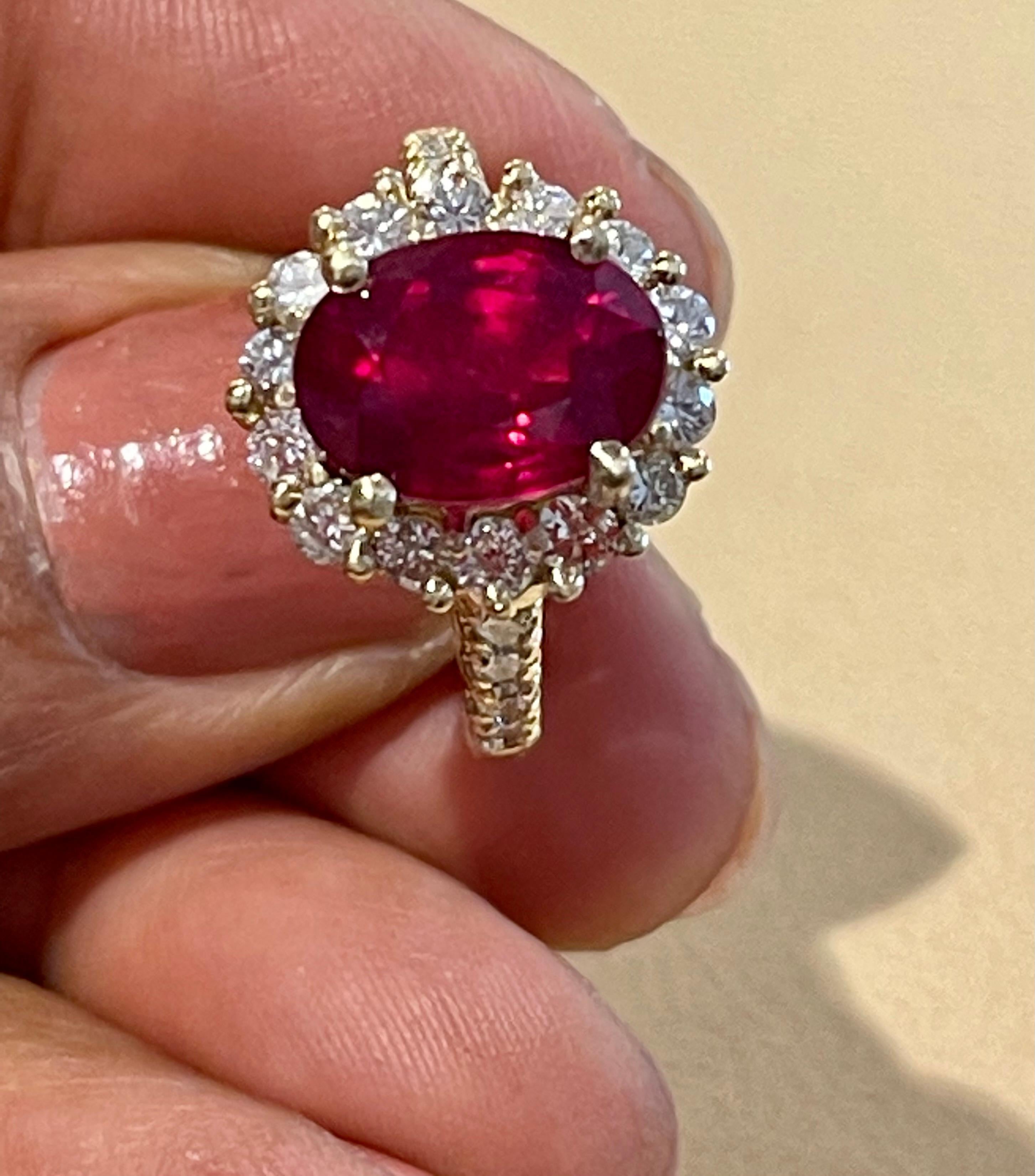 Women's Oval 5 Carat Treated Ruby and 1.25 Carat Diamond 14 Karat Yellow Gold Ring