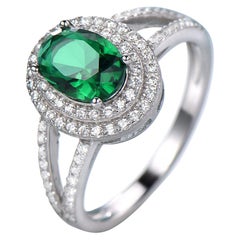 Oval 6 x 8 Emerald Green Cubic Zirconia Double Halo Split Shank Silver Ring