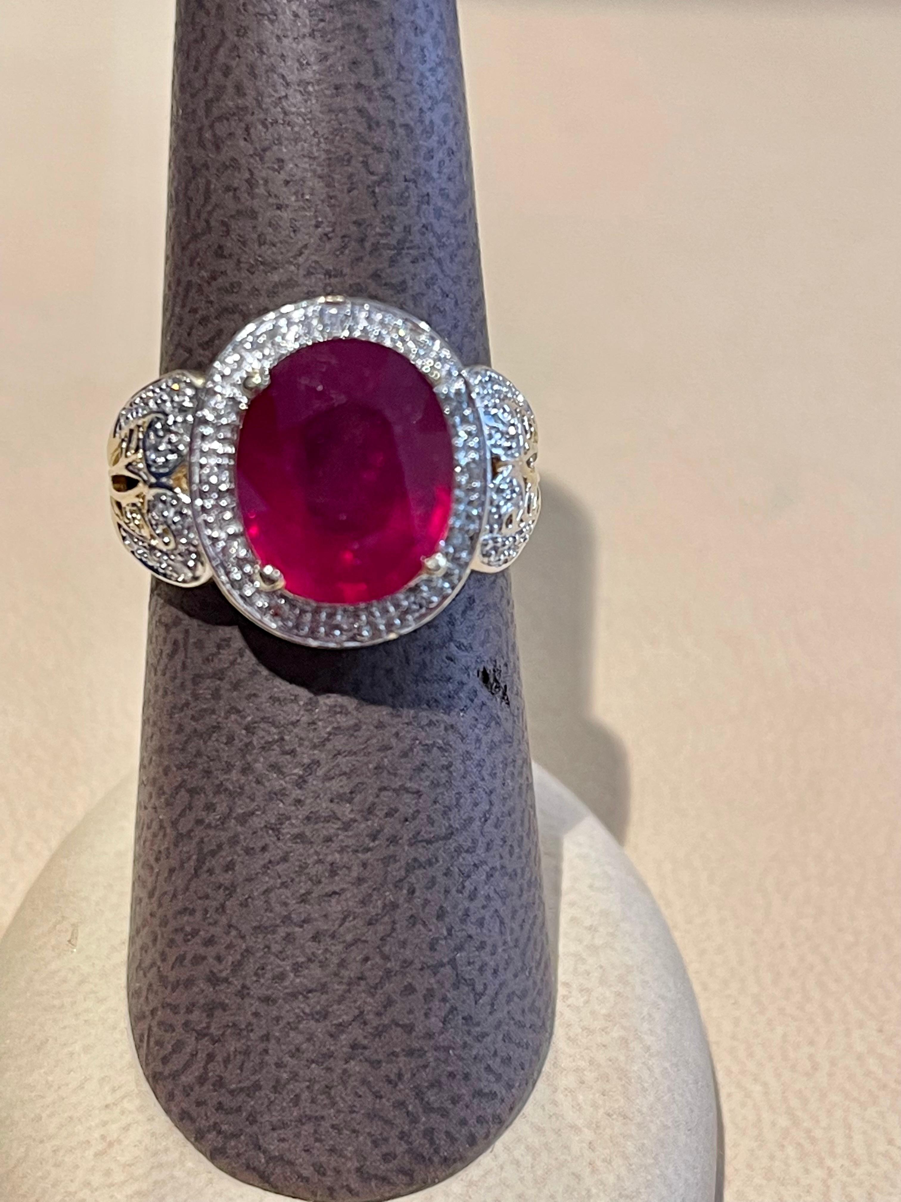 Oval 7.5 Carat Treated Ruby and 1 Carat Diamond 14 Karat Yellow Gold Ring For Sale 5