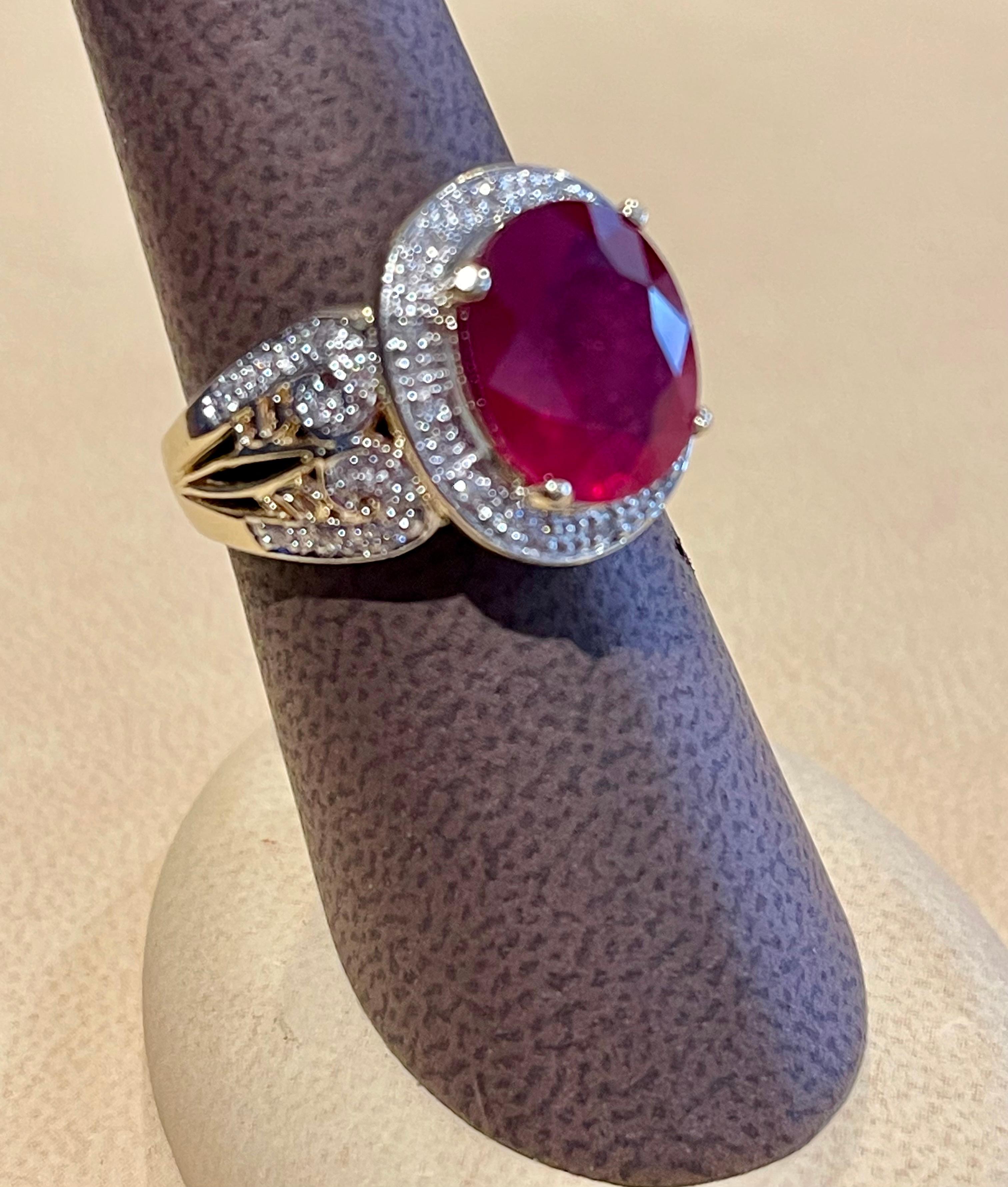 Oval 7.5 Carat Treated Ruby and 1 Carat Diamond 14 Karat Yellow Gold Ring For Sale 6