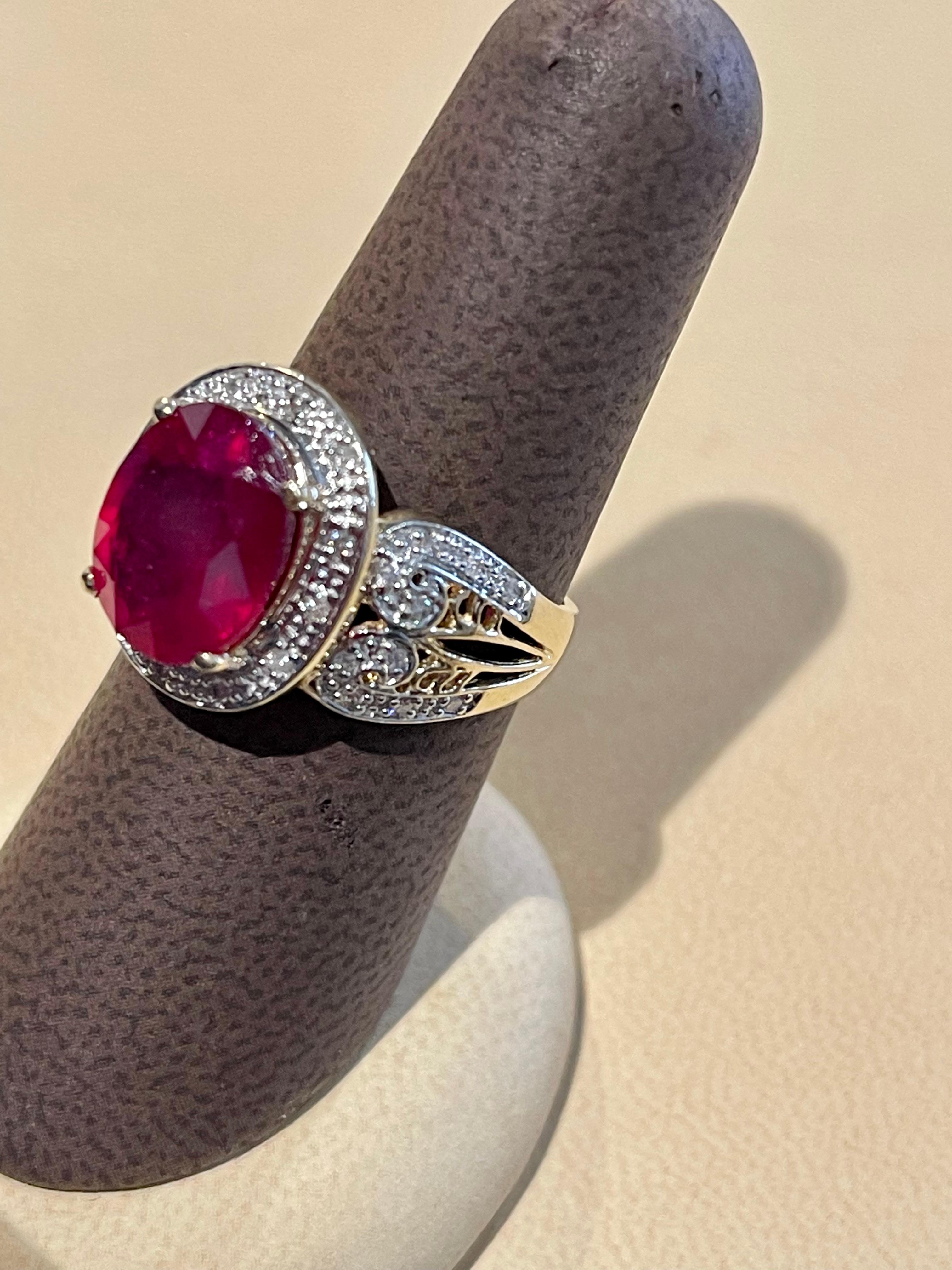 Oval 7.5 Carat Treated Ruby and 1 Carat Diamond 14 Karat Yellow Gold Ring For Sale 7