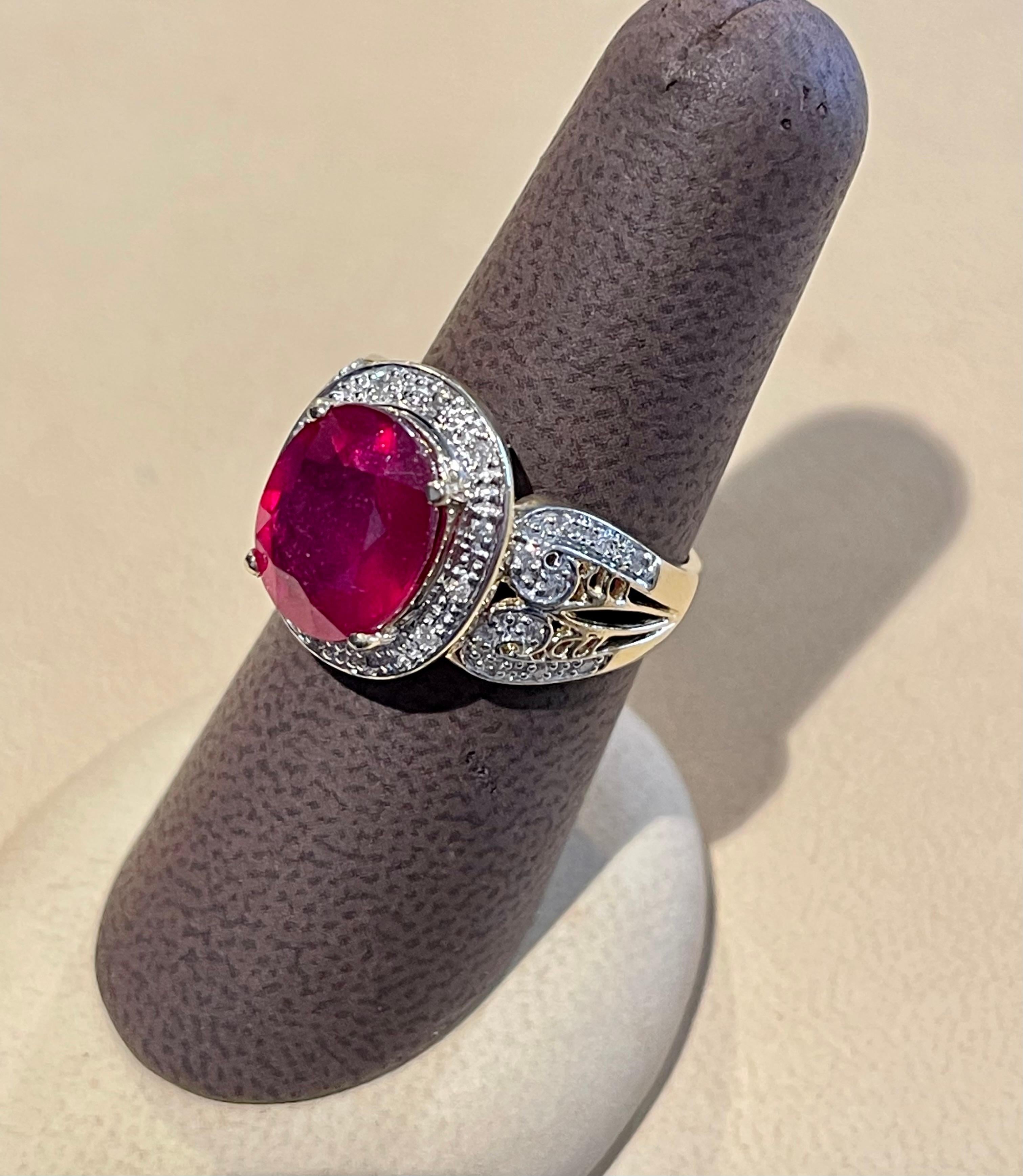 Oval 7.5 Carat Treated Ruby and 1 Carat Diamond 14 Karat Yellow Gold Ring For Sale 8