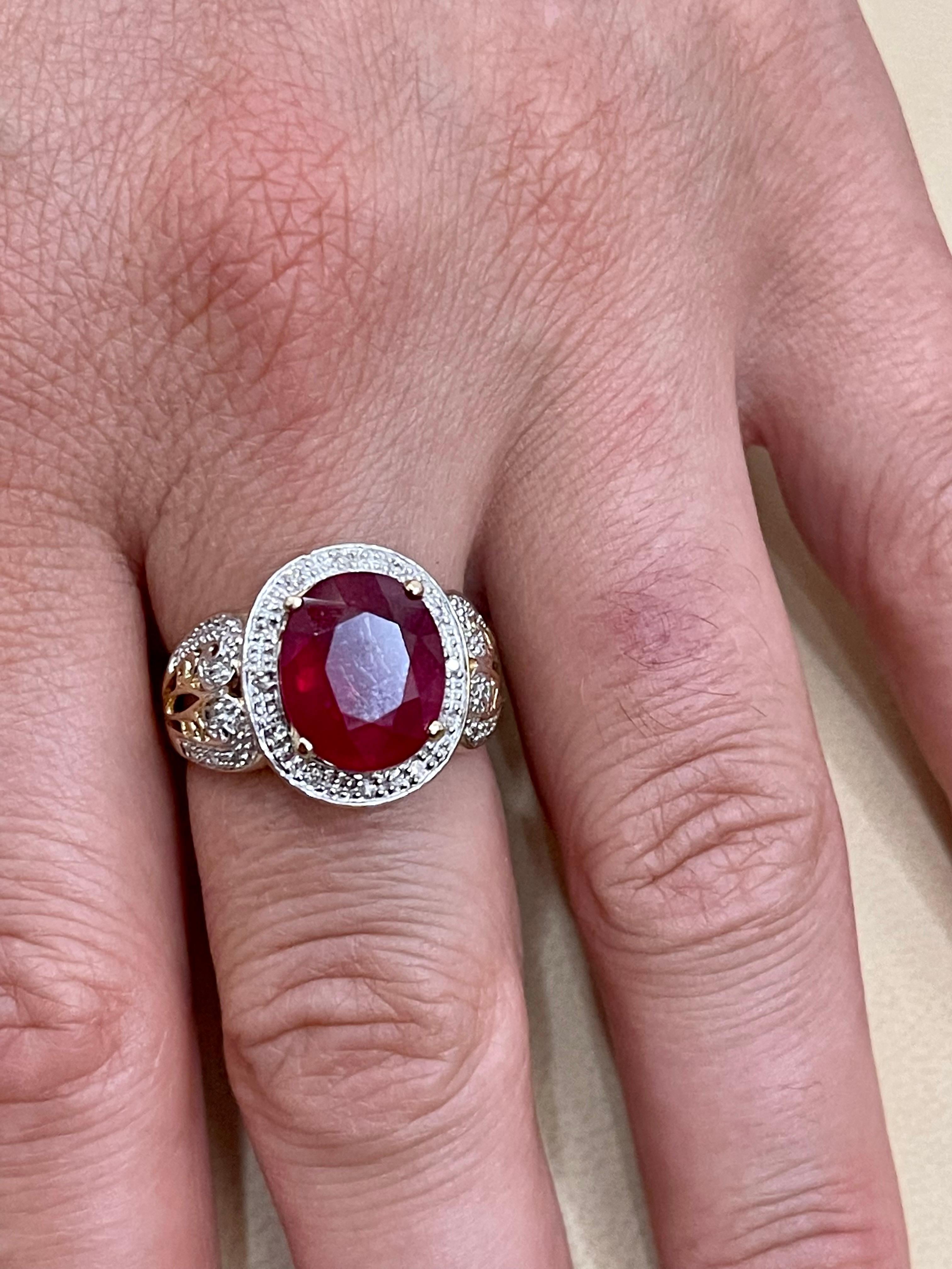 Women's Oval 7.5 Carat Treated Ruby and 1 Carat Diamond 14 Karat Yellow Gold Ring For Sale