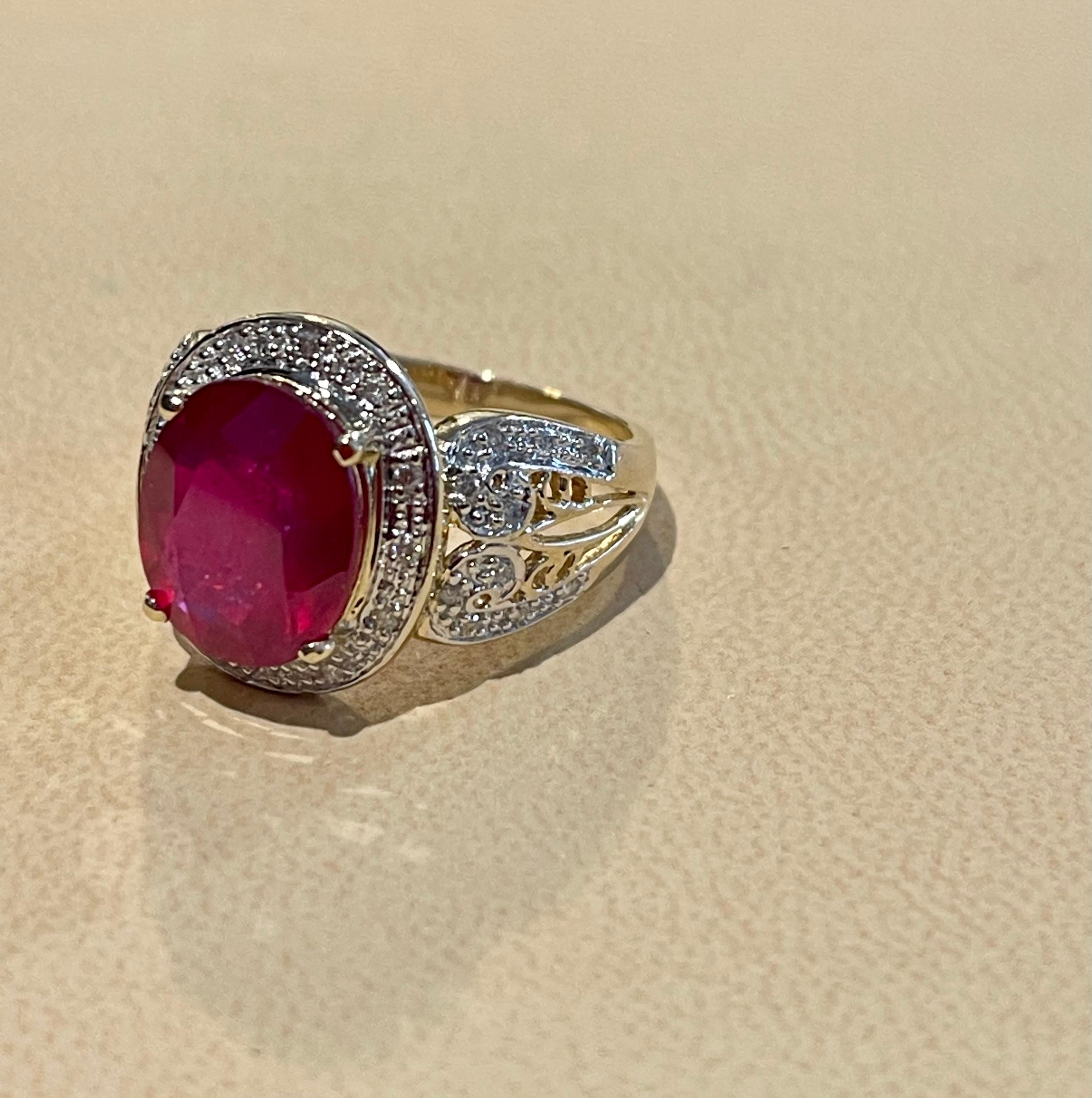 Oval 7.5 Carat Treated Ruby and 1 Carat Diamond 14 Karat Yellow Gold Ring For Sale 1