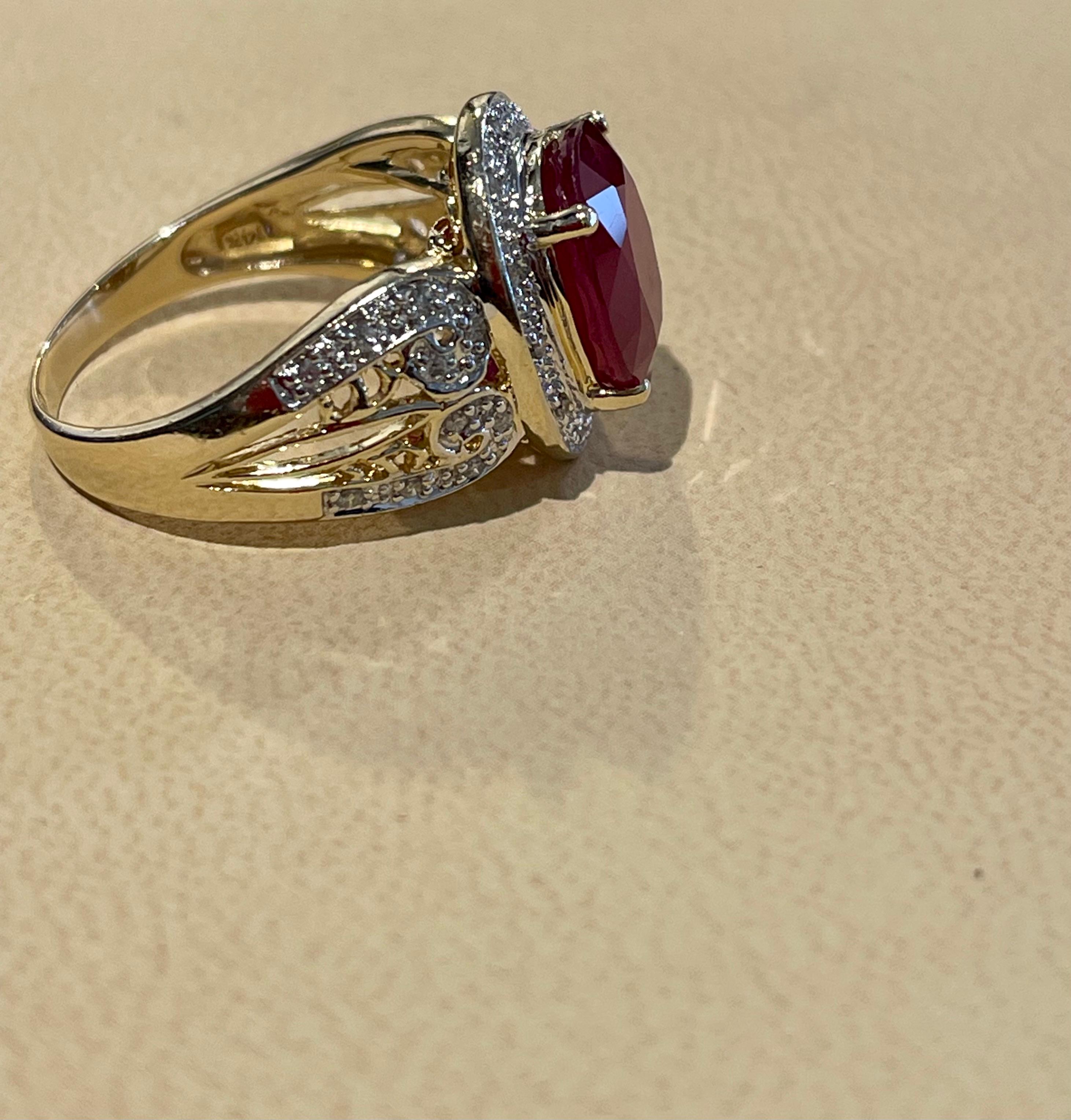 Oval 7.5 Carat Treated Ruby and 1 Carat Diamond 14 Karat Yellow Gold Ring For Sale 2