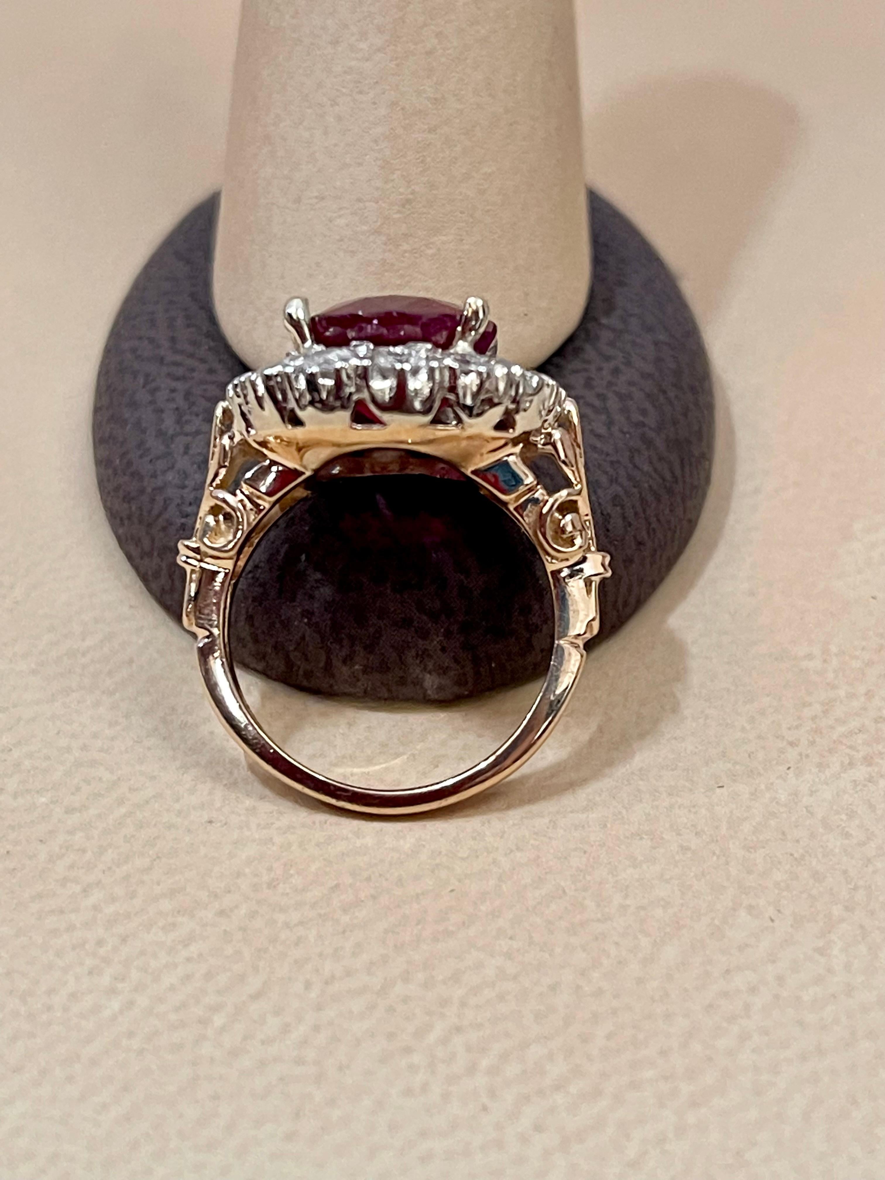 Oval 8 Carat Treated Ruby and 1 Carat Diamond 14 Karat Two Tone Gold Ring In Excellent Condition For Sale In New York, NY