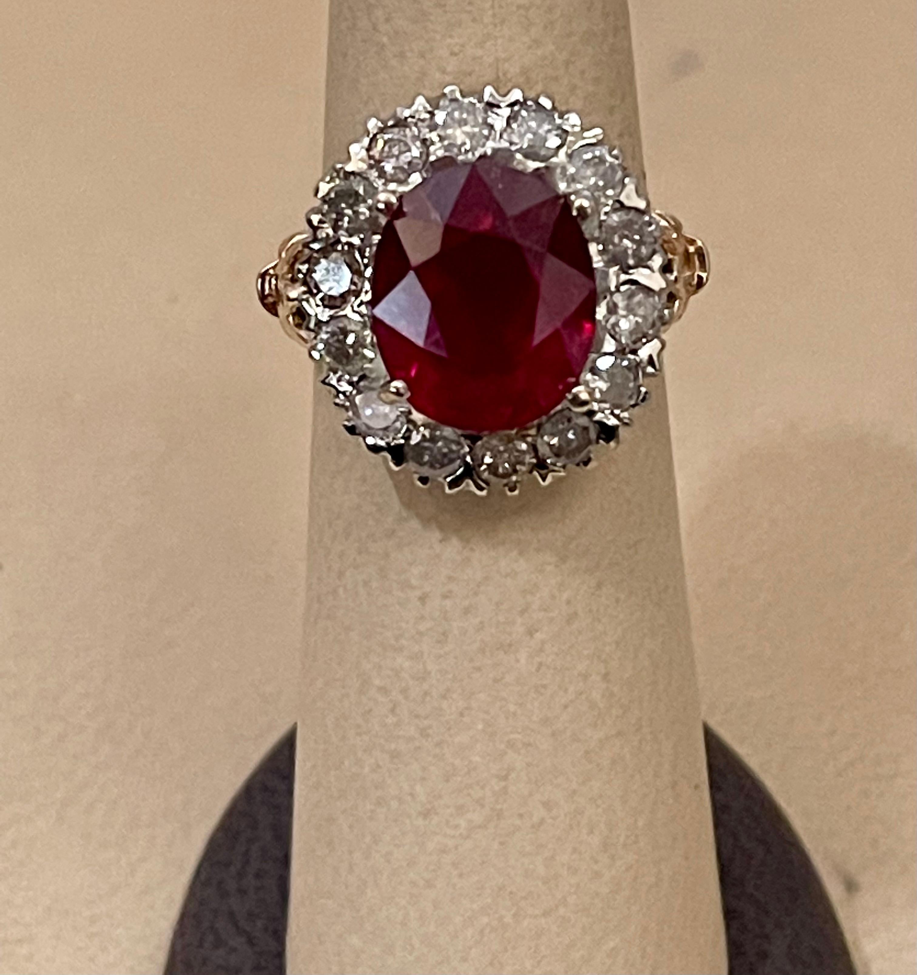 Oval 8 Carat Treated Ruby and 1 Carat Diamond 14 Karat Two Tone Gold Ring For Sale 1