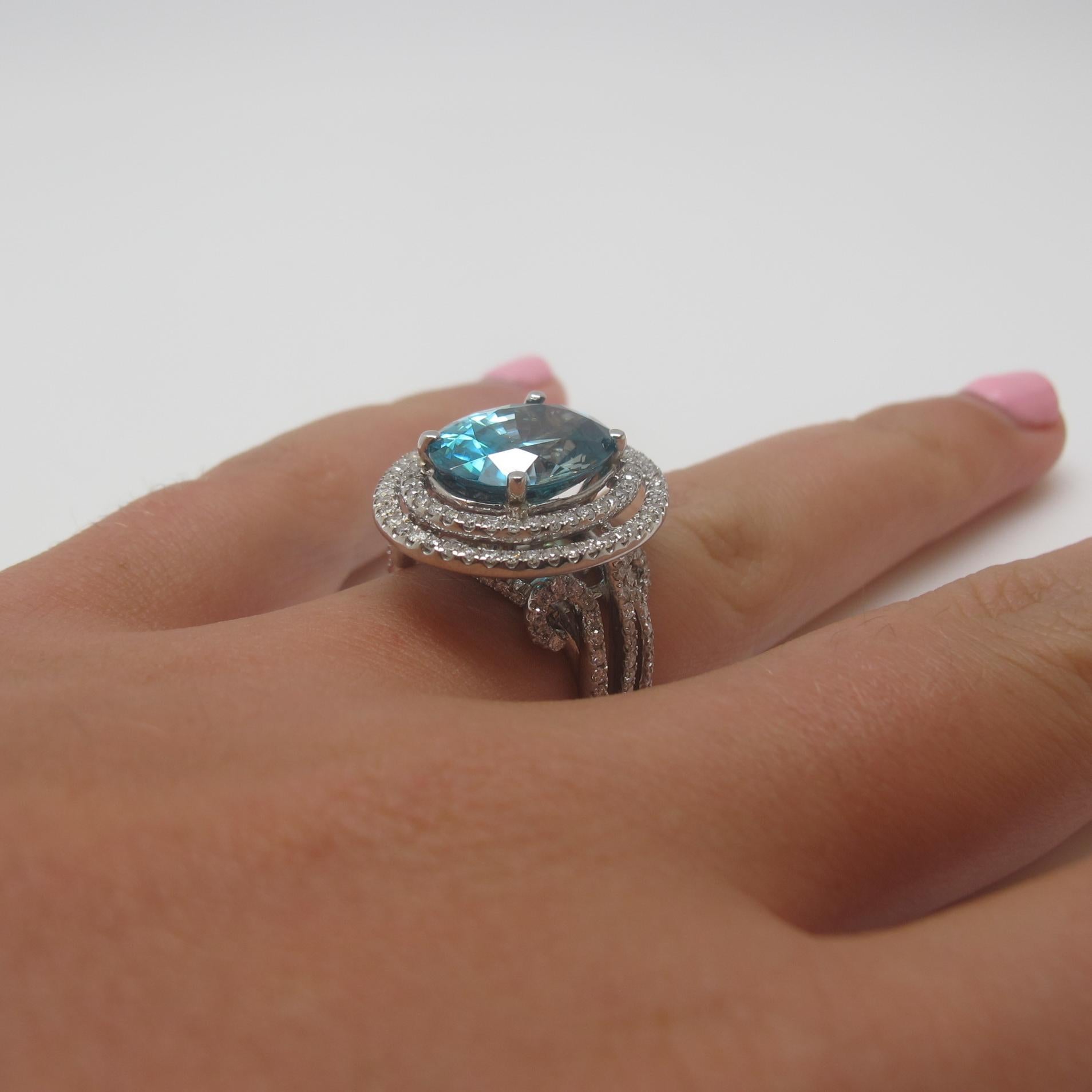 Oval Cut Oval 9.43 Carat Blue Zircon with 1.26 Carat Diamond 18 Karat White Gold Ring