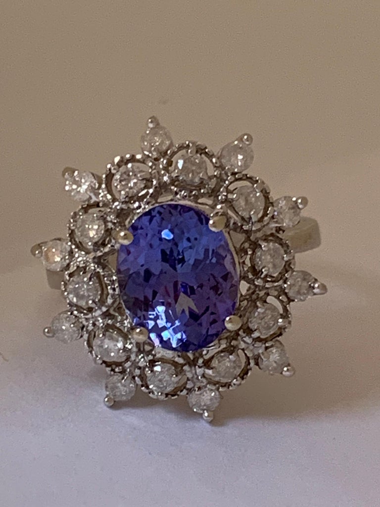 Oval AA Tanzanite and Diamond Ring For Sale at 1stDibs