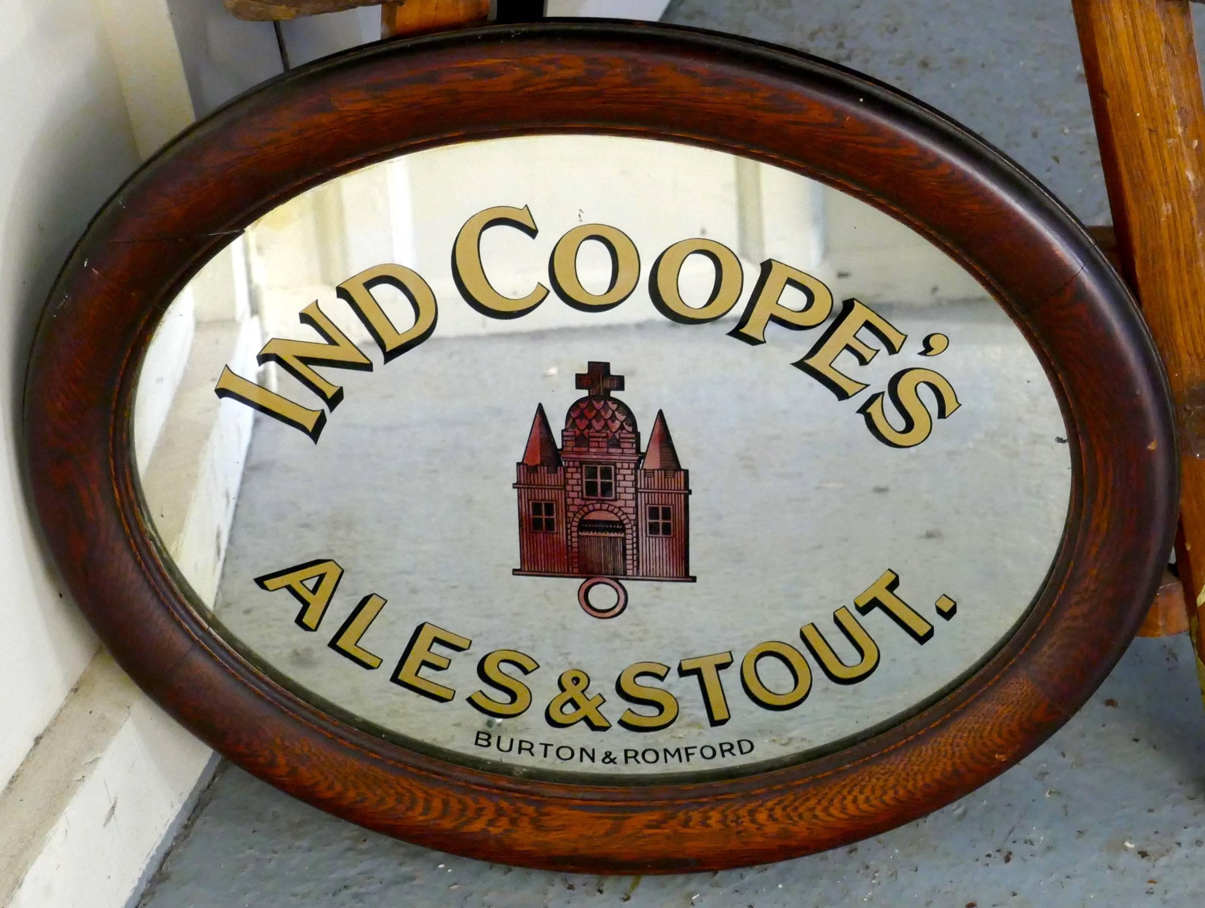 An oval advertising mirror, pub mirror for Ind Coope.

This is wonderful pictorial advertising mirror, advertising “Ind Coope’s Ales and Stout” Burton & Romford 
The mirror has a picture of the brewery in the centre and is in good original