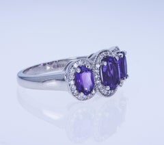 Oval Amethyst and Diamond 3-Stone Ring