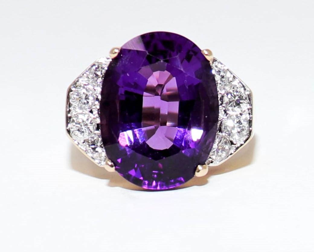 Ring size 7.25

Breathtaking amethyst and diamond cocktail ring bursting with sparkle! This stunning statement piece features a large oval mixed cut amethyst stone in a beautifully saturated purple color. The gorgeous purple stone is vertically set