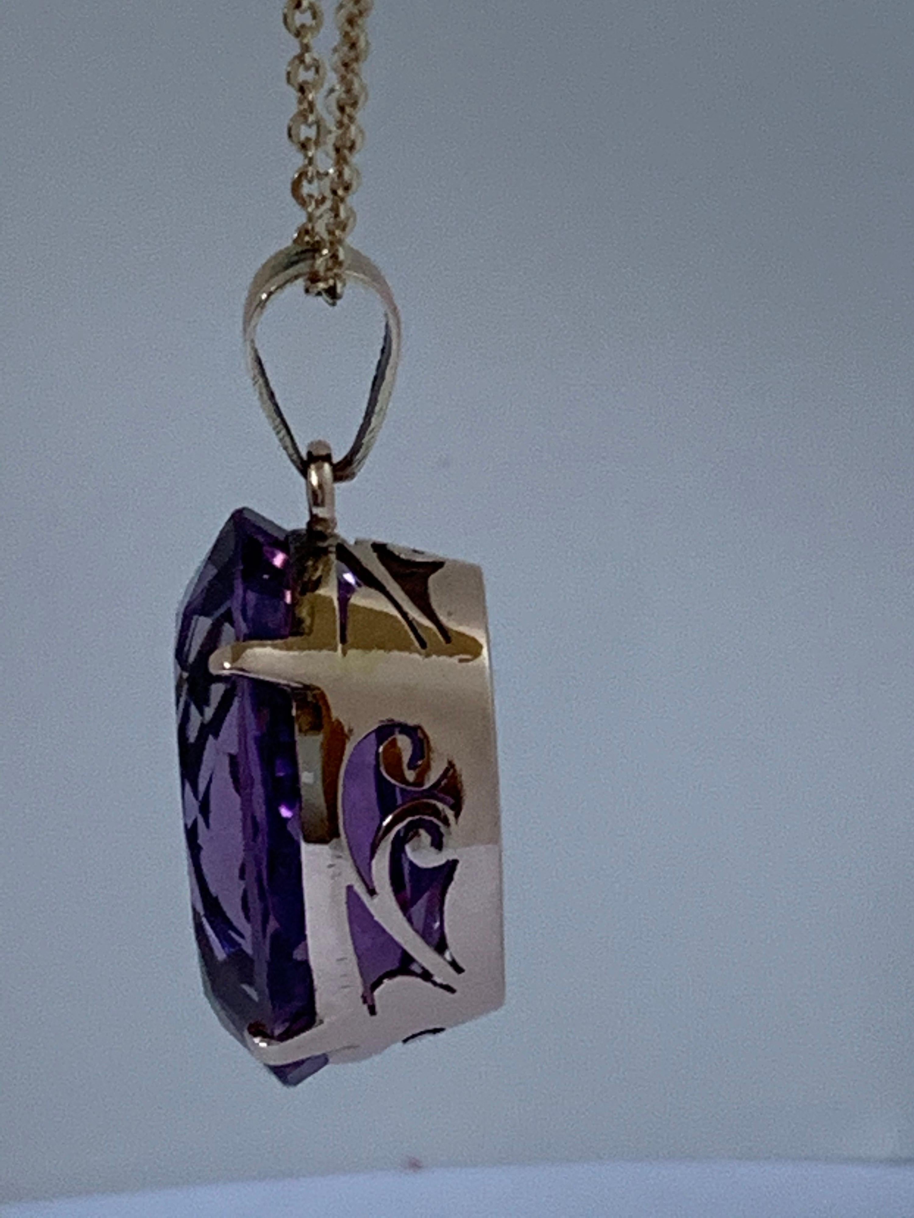 Oval 15 mm X 20 mm Amethyst set in 14 Karat Yellow gold is one of a kind handcrafted Pendant, The stone also hand cut and polished. The Amethyst is not treated or colored, this is 100 % natural stones.

Note: The Chain is not included in this