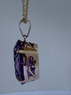 Oval Amethyst Set in 14 Karat Gold Pendant