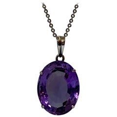 Oval Amethyst Set in 14 Karat Gold Pendant