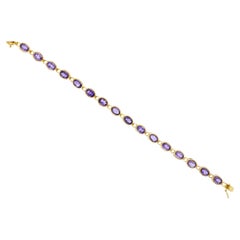 Ovales Amethyst-Tennisarmband 14k Gelbgold