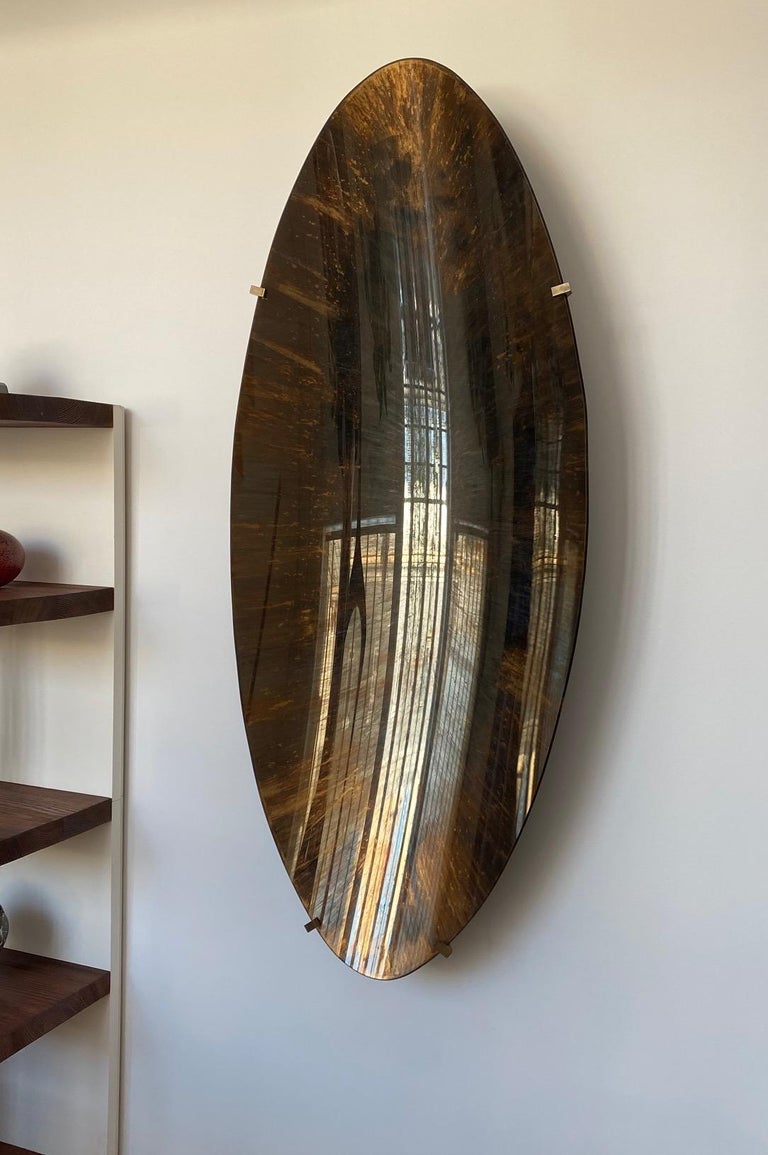 Glass Oval and Concave Golden Oxidation Mirror by Christophe Gaignon For Sale