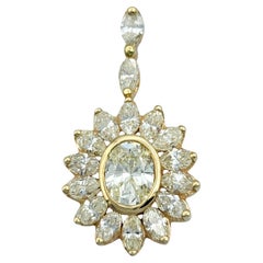Oval and Marquise Cut Diamond Sunburst Dangle Pendant in 14 Karat Yellow Gold