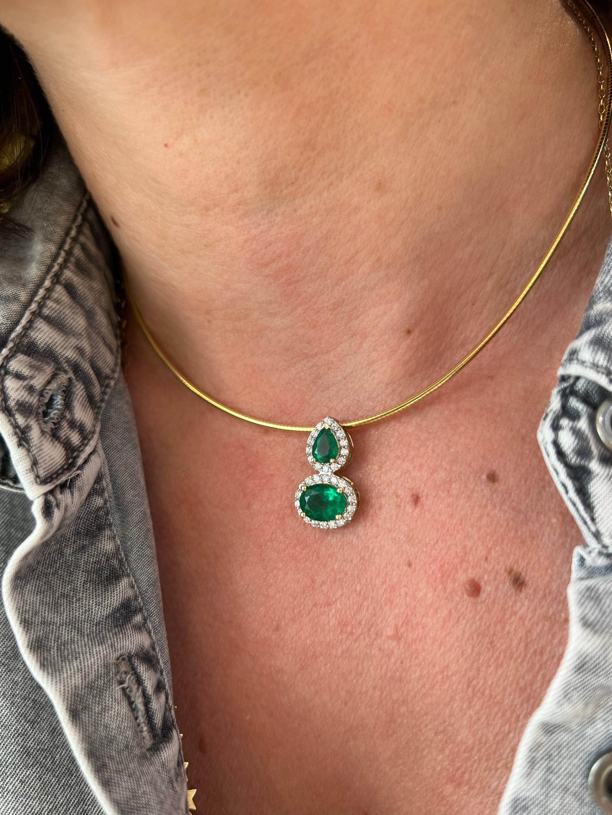 Modern Oval and Pear Shape Emerald Pendant with Diamond Halo on Omega Chain For Sale