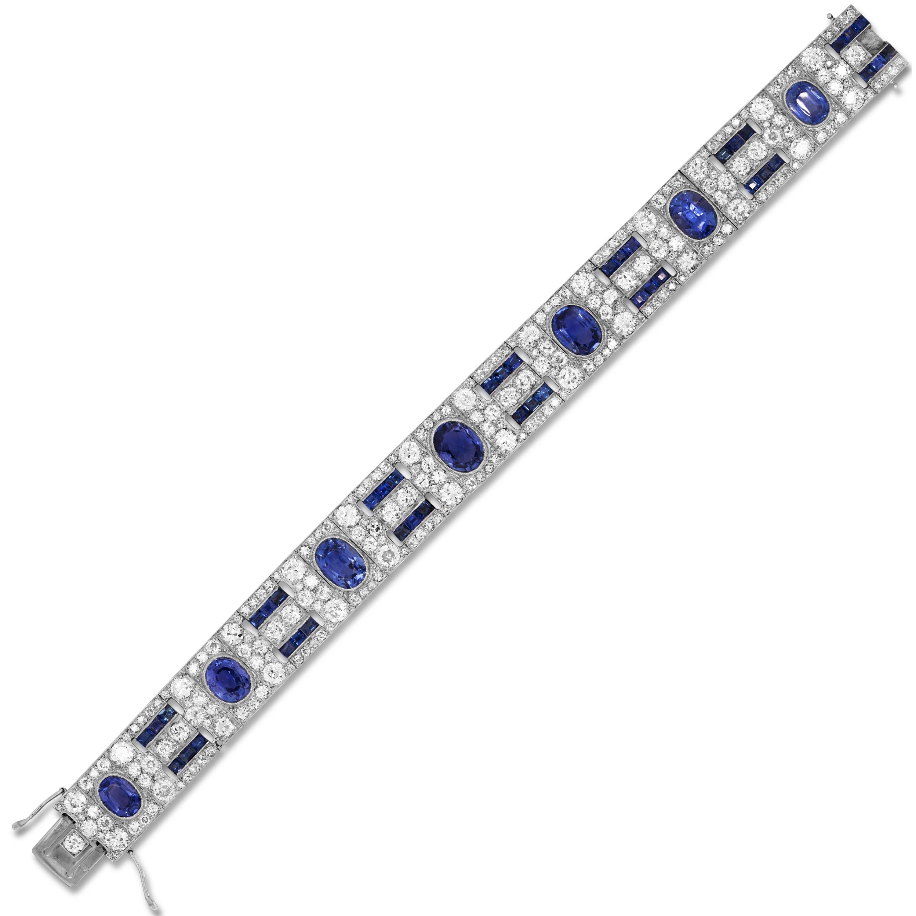 Oval and Princess Cut Blue Sapphires Diamonds 18 Karat Gold Bracelet

This state-of-the-art bracelet features oval and princess cut blue sapphires and diamonds set all throughout.

Apprx. 26 carat Blue Sapphires total weight

Apprx. 18.50 carat F-G