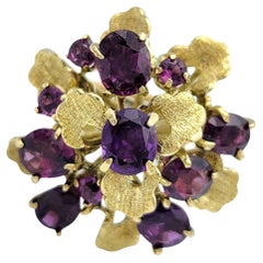 Oval and Round Cut Garnet Cluster Cocktail Ring in 14 Karat Yellow Gold