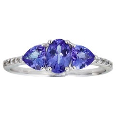 Oval and Trillion-cut Tanzanite With Diamond accents 10K White Gold Ring.
