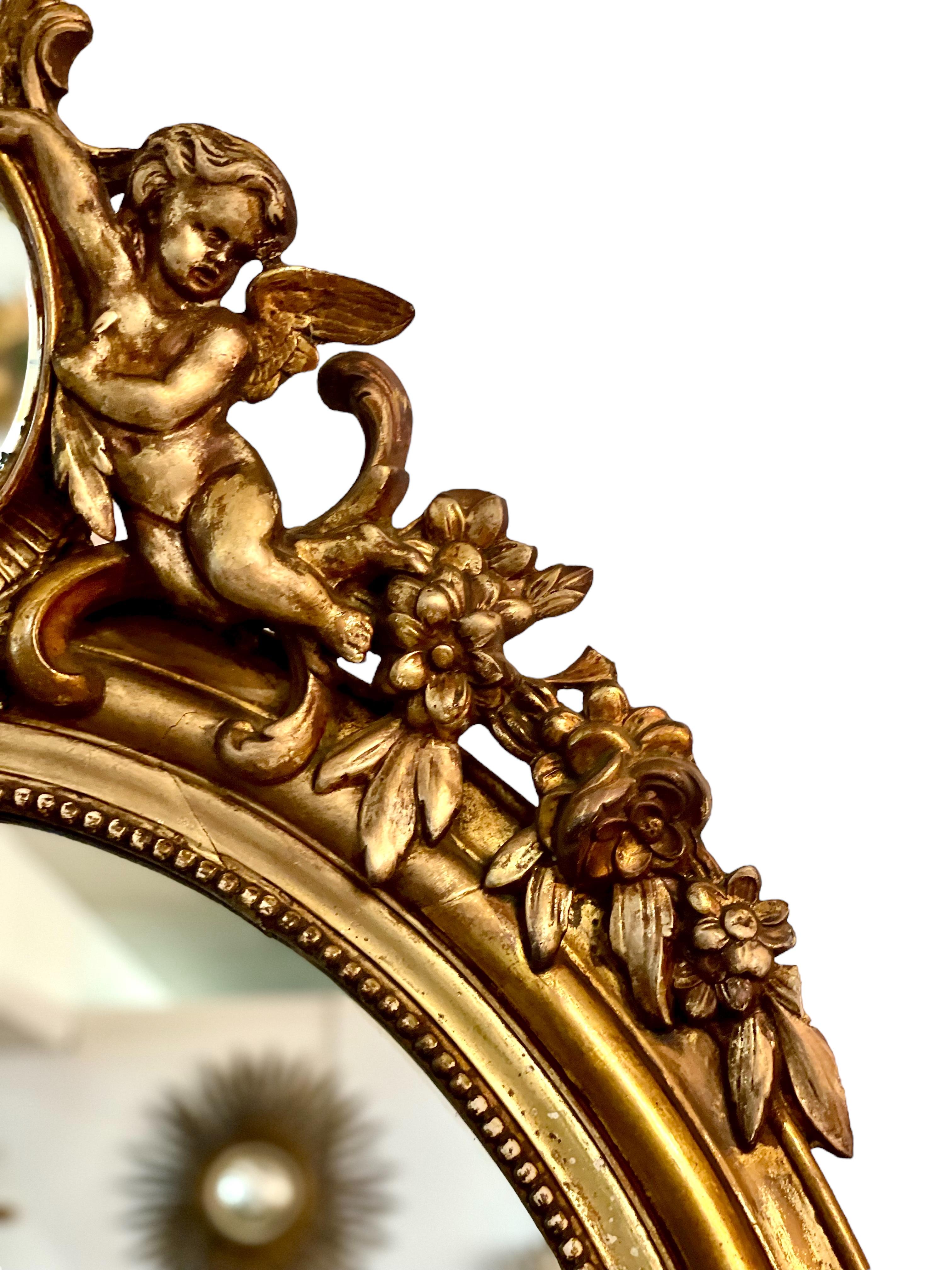 French Antique Oval Giltwood Mirror with Cherubs For Sale 3