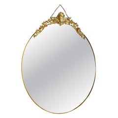Oval Antique Rococo Style Brass Mirror Ornamental Putto, 1960s Italy