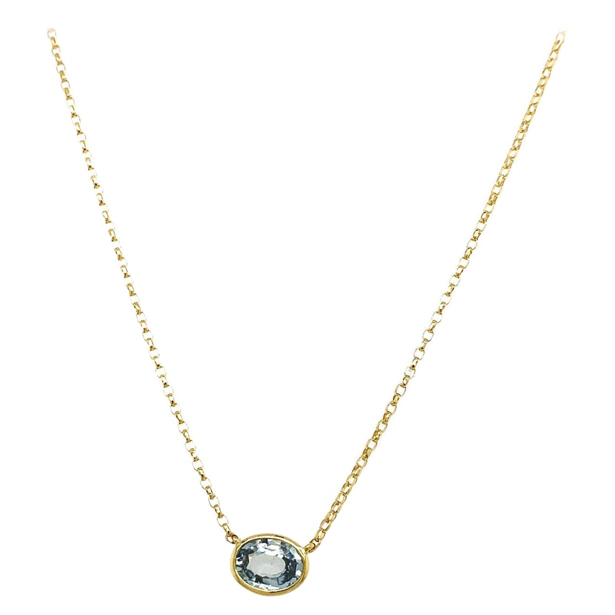 Pendentif aigue-marine ovale 0,75 carat sur chaîne en or jaune 18 carats