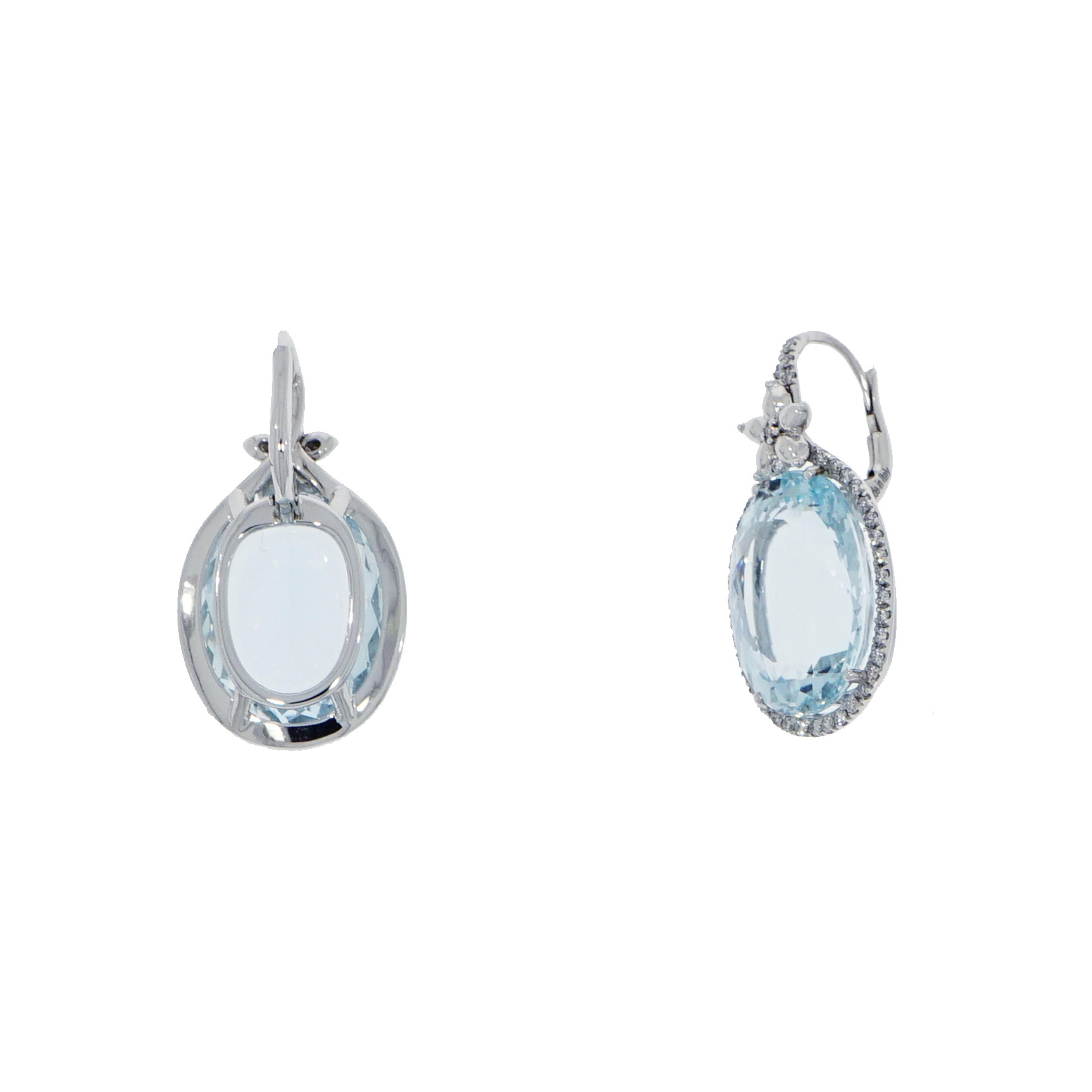 Aquamarine is an incredibly unique gemstone that's been slowly trending up. It's shimmery and has a soft color, which makes it somewhat of a neutral. 
Pairing it with diamonds this 25.04 carats total of oval Aquamarine will totally blow you